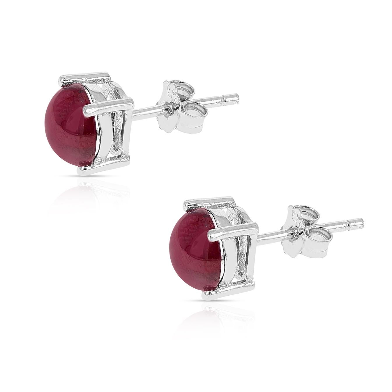A pair of 7MM Genuine Tourmaline Round Cabochon Stud Earrings made in Sterling Silver. The total stone weight is approximately  3.10 carats.