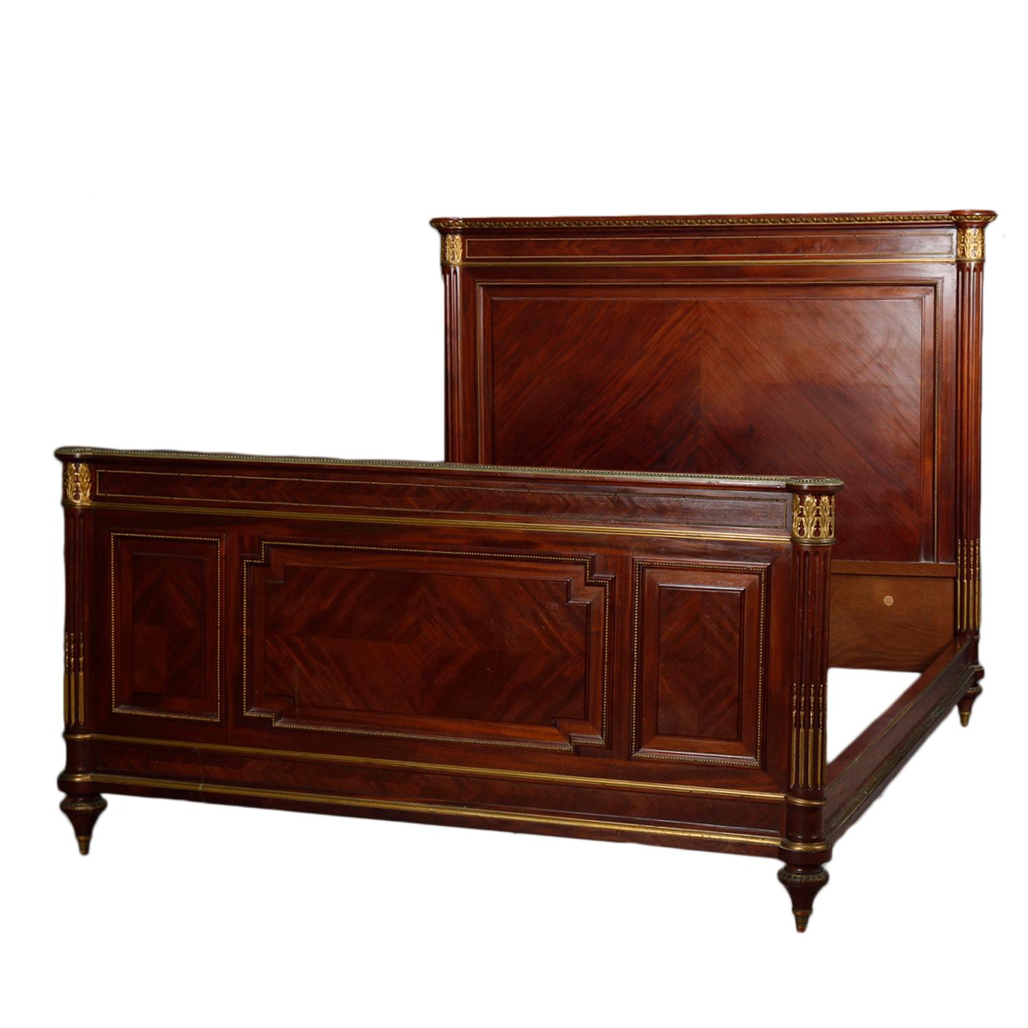 French Louis XVI mahogany Marquetry & ormolu bedroom suite includes:
1) Signed French Louis XVI chest of drawers by Francois Linke offers marble top surmounting mahogany case with parquetry facing and flanking column supports with four long