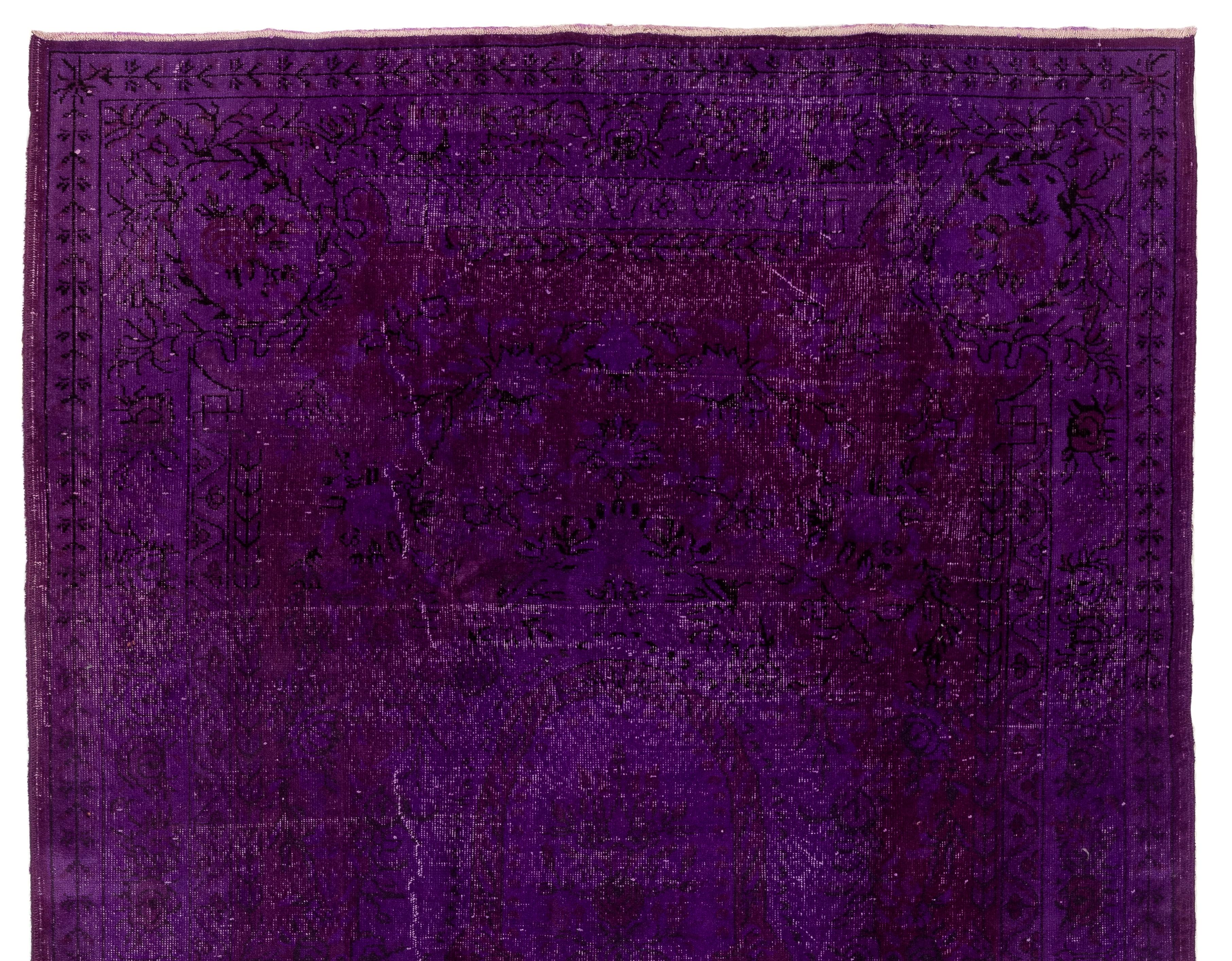 A vintage Turkish rug re-dyed in purple color.
Finely hand knotted, low wool pile on cotton foundation. Deep washed.
Sturdy and can be used on a high traffic area, suitable for both residential and commercial interiors. Measures: 7 x 10 ft.
 