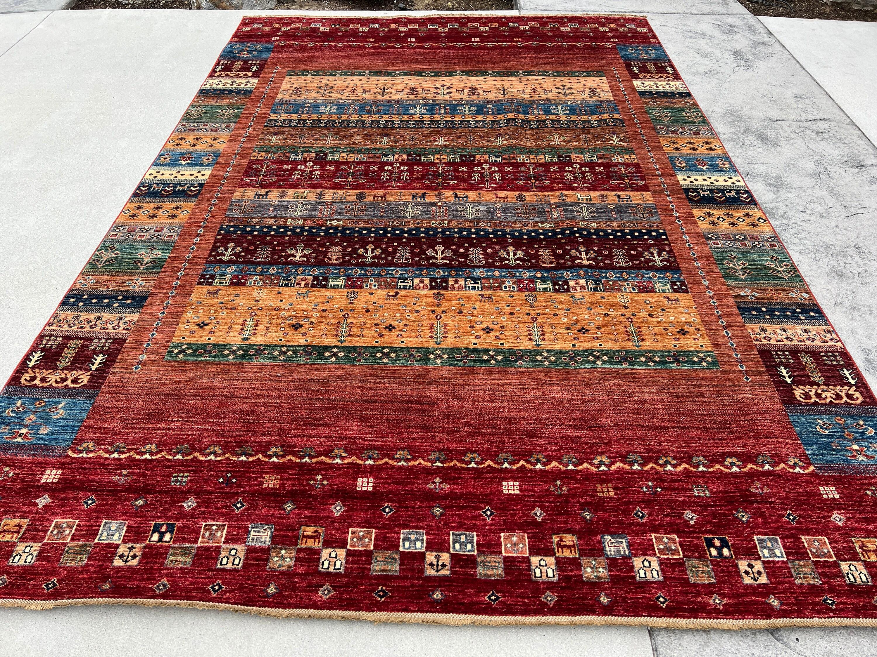 This rug was made with 100% premium, Afghan-sourced Ghazni wool with a cotton foundation. The rich colors are dipped in natural dyes to create an heirloom finish that does not bleed and is meant to last for generations. Sourced through fair trade