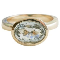 7x10mm Faceted Oval Aquamarine 14kt Yellow Gold Ring - Size 7