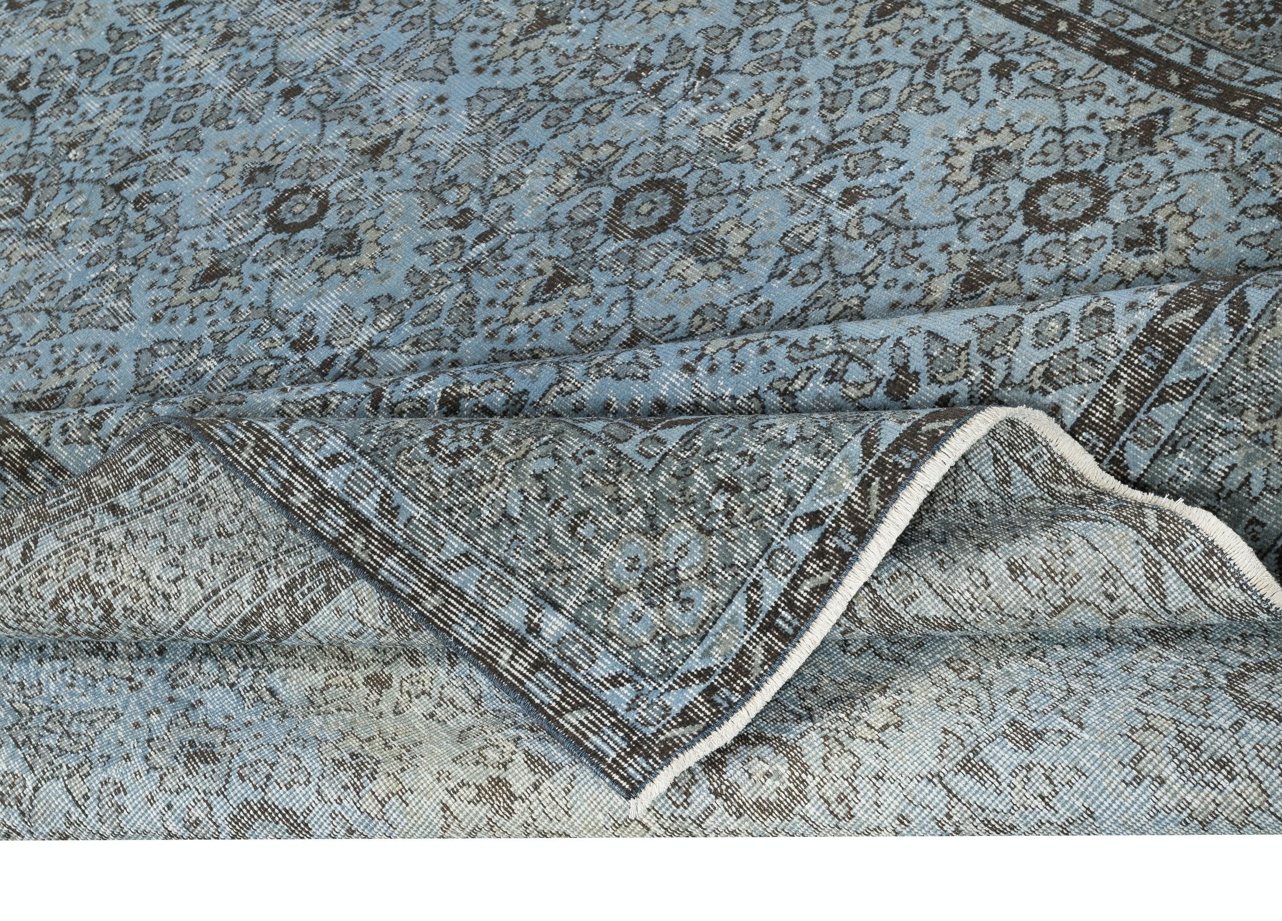 Moderno 7x11.5 Ft Tappeto moderno fatto a mano in lana turca di colore blu con design floreale in vendita