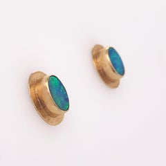 Natural Opal Stud Earrings Encased in 14 Karat Yellow Gold Bezels