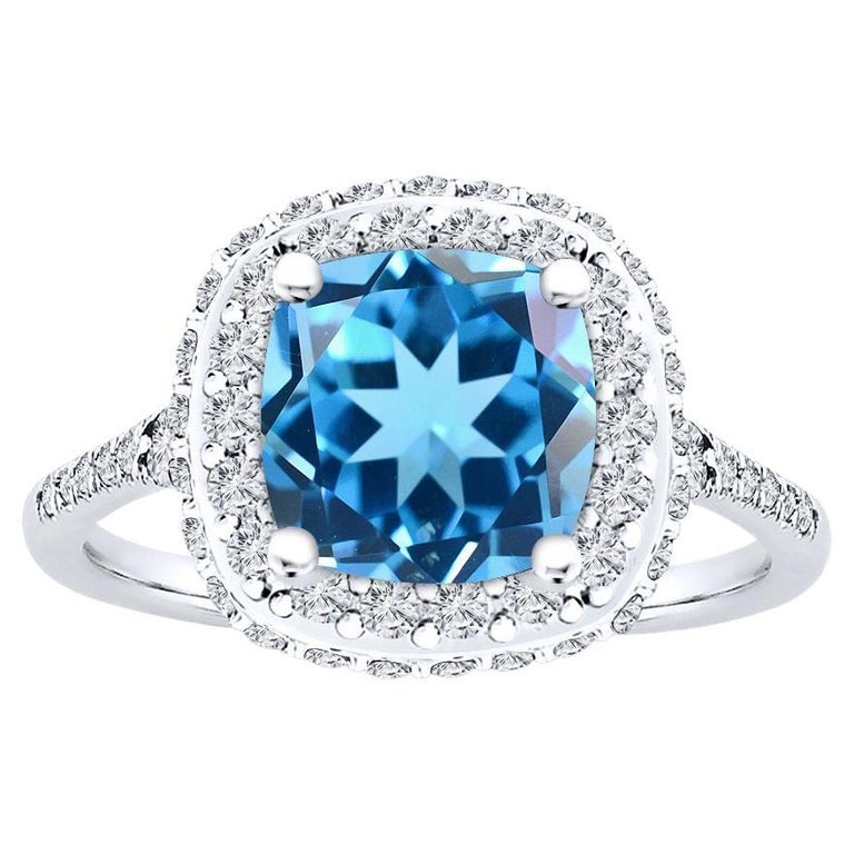 Bague en topaze bleue naturelle suisse taille coussin et halo de diamants  0,75 carat - Personnalisable en vente sur 1stDibs