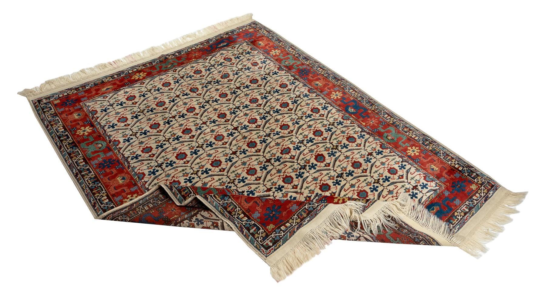 A fine Turkish area rug and 100% natural dyed wool.
Finely hand-knotted with even medium wool pile on wool foundation. Sturdy and can be used in a high traffic area, suitable for both residential and commercial interiors. Measures: 7 x 9 Ft.