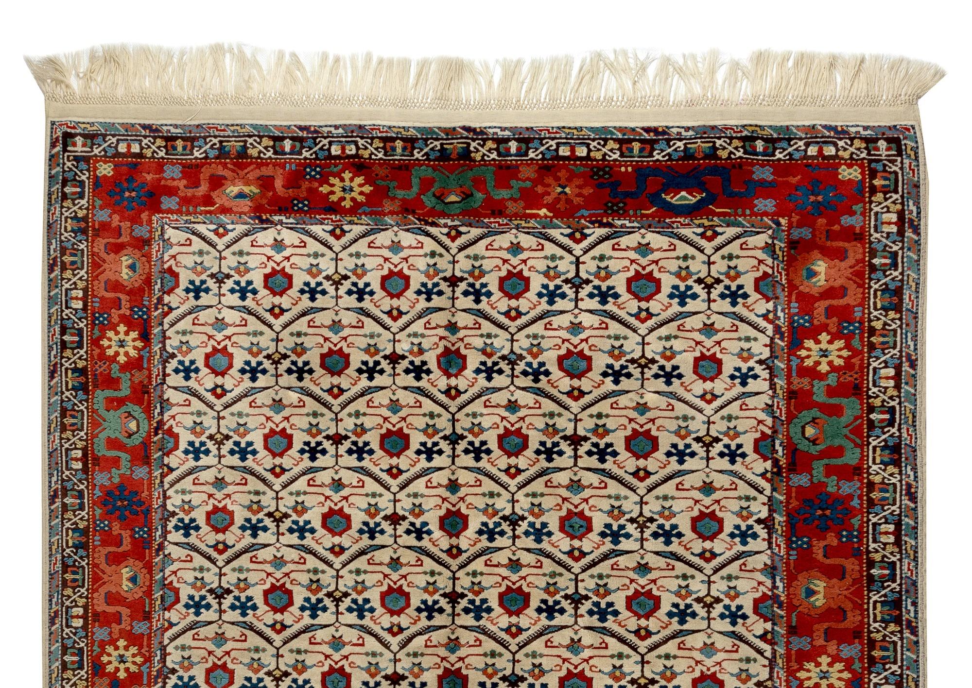 A fine Turkish area rug and 100% natural dyed wool.
Finely hand-knotted with even medium wool pile on wool foundation. Sturdy and can be used in a high traffic area, suitable for both residential and commercial interiors. Measures: 7 x 9 Ft.