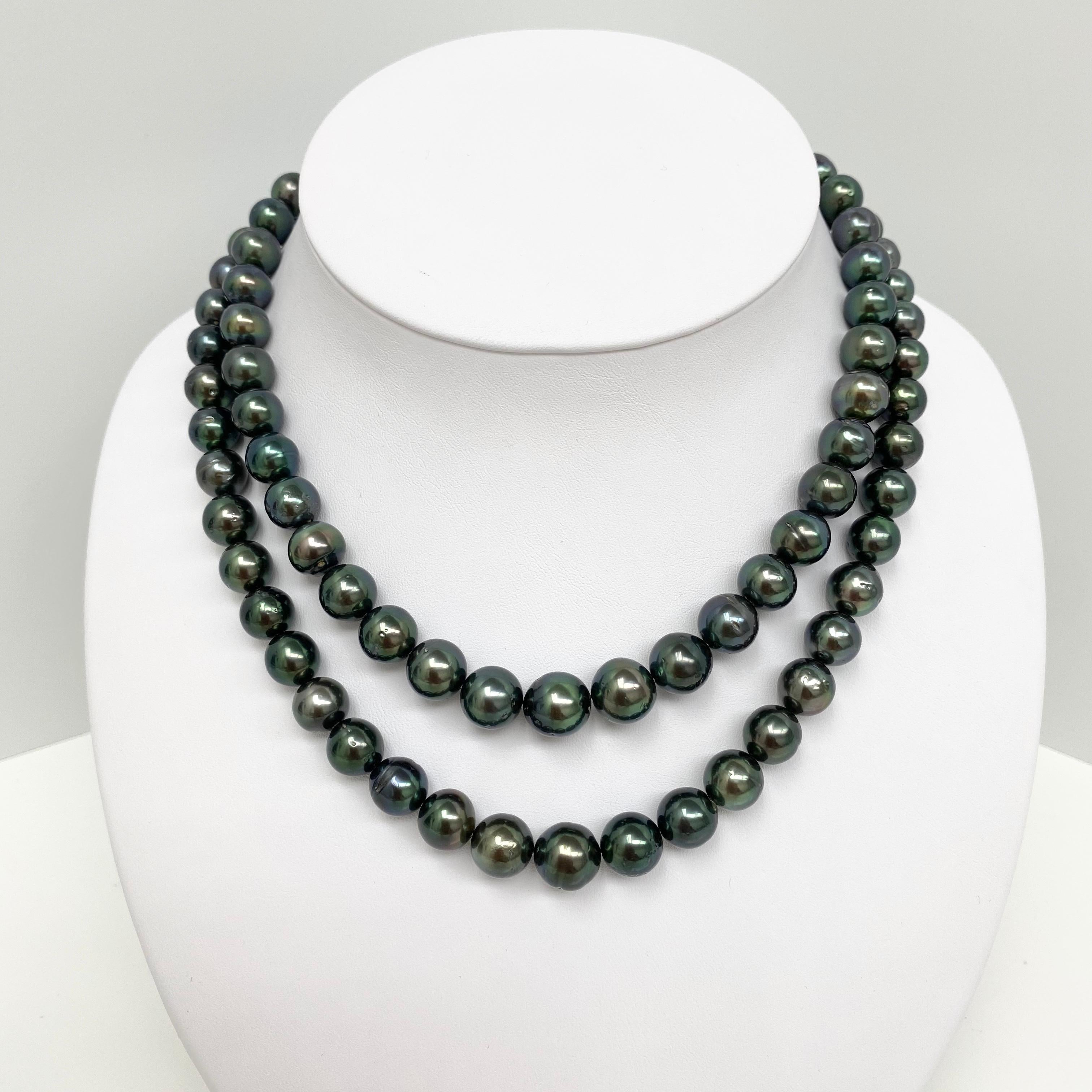 8-10mm Tahitian Peacock Near-Round Double-Strand Pearl Necklace with Gold Clasp
AAA Quality, Tahitian Peacock Near-Round Double-Strand Pearl Necklace, 36 inches hand-knotted with gold fish-hook clasp #CP99
