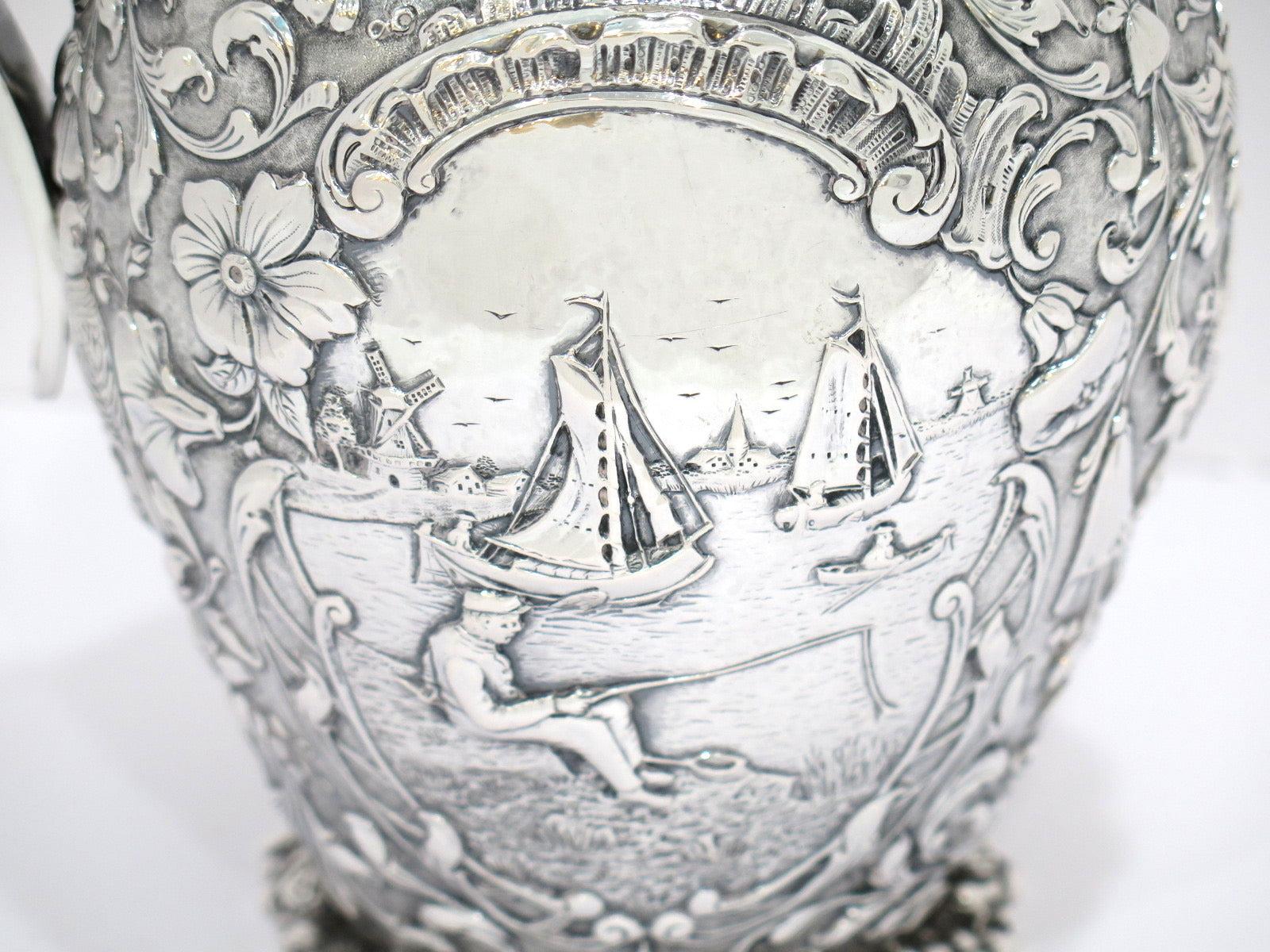8 7/8 in - European Silver Antique Dutch Scenery Flowers Birds Repousse Pitcher For Sale 1