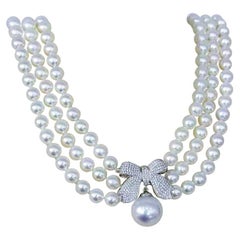 【Crown Radiance】Aurora Akoya Pearl Triple-Strand Necklace with Diamond Bow Clasp