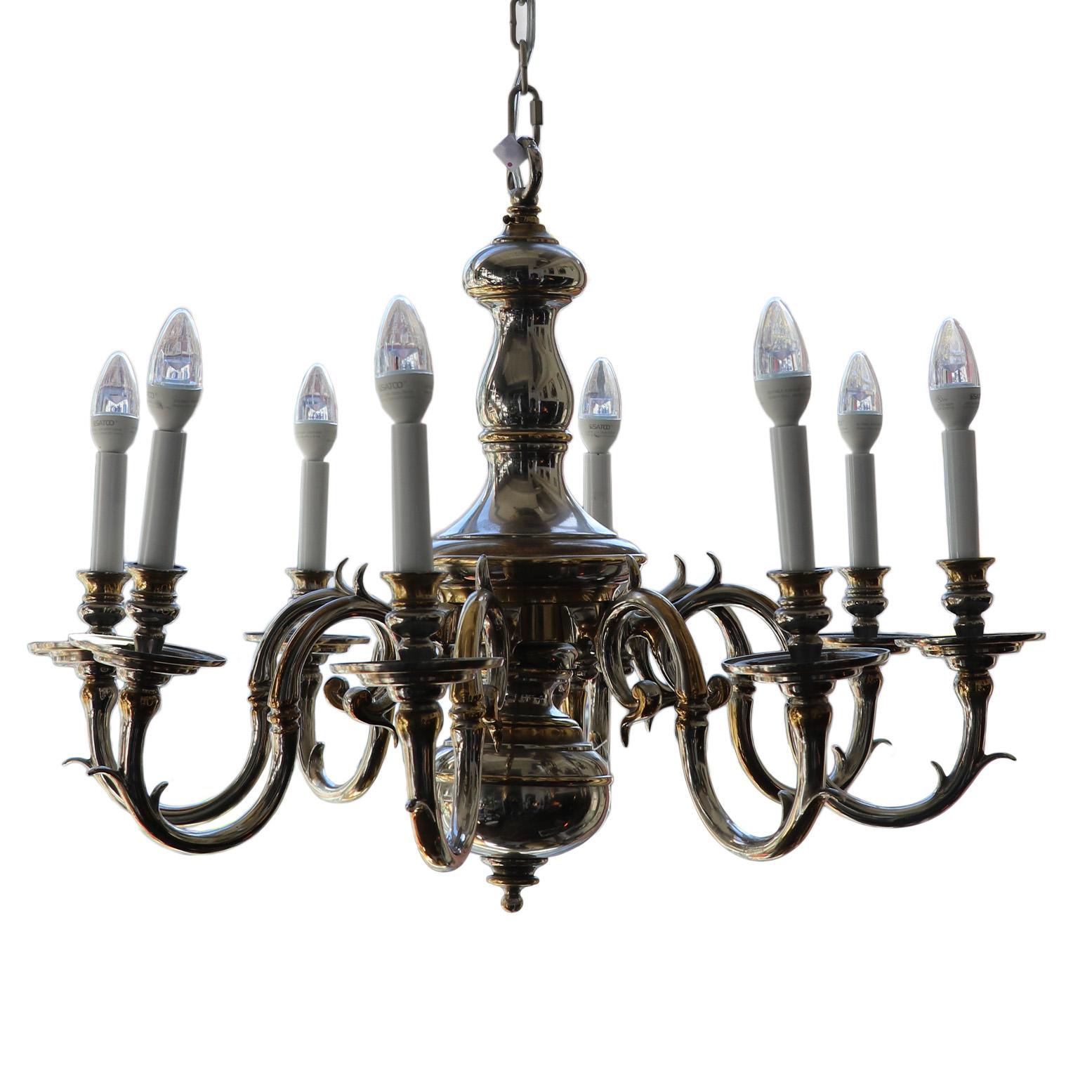 Transform your living space with this magnificent brass chandelier featuring eight arms, elegantly designed to illuminate your home. This stunning centerpiece is ready to add a touch of sophistication and glamour to any room.