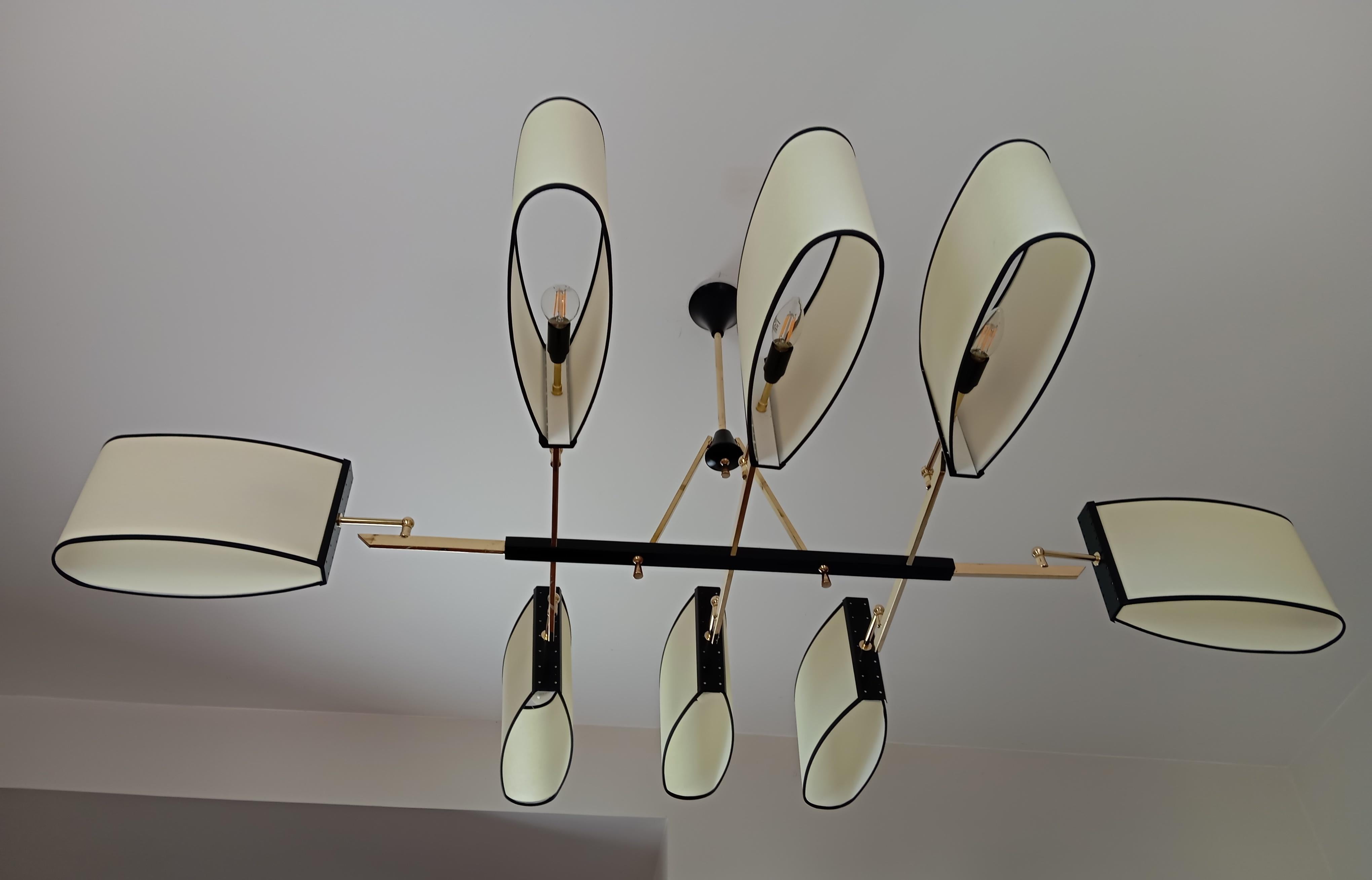 Metal 8-arm chandelier, Maion Lunel circa 1950 For Sale