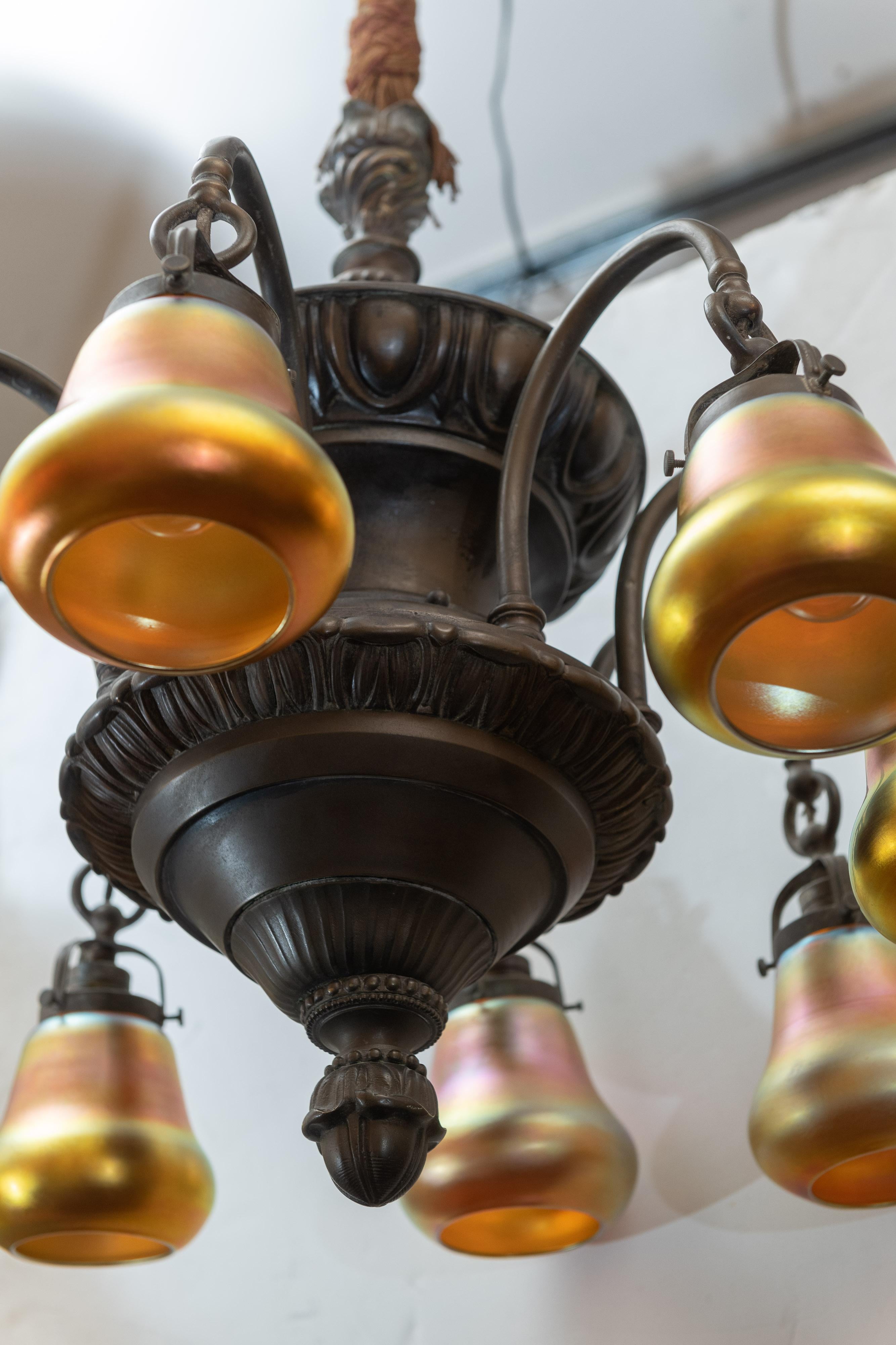 Hand-Crafted 8-Arm Edwardian Chandelier in Bronze with 8 Steuben Art Glass Shades, circa 1910