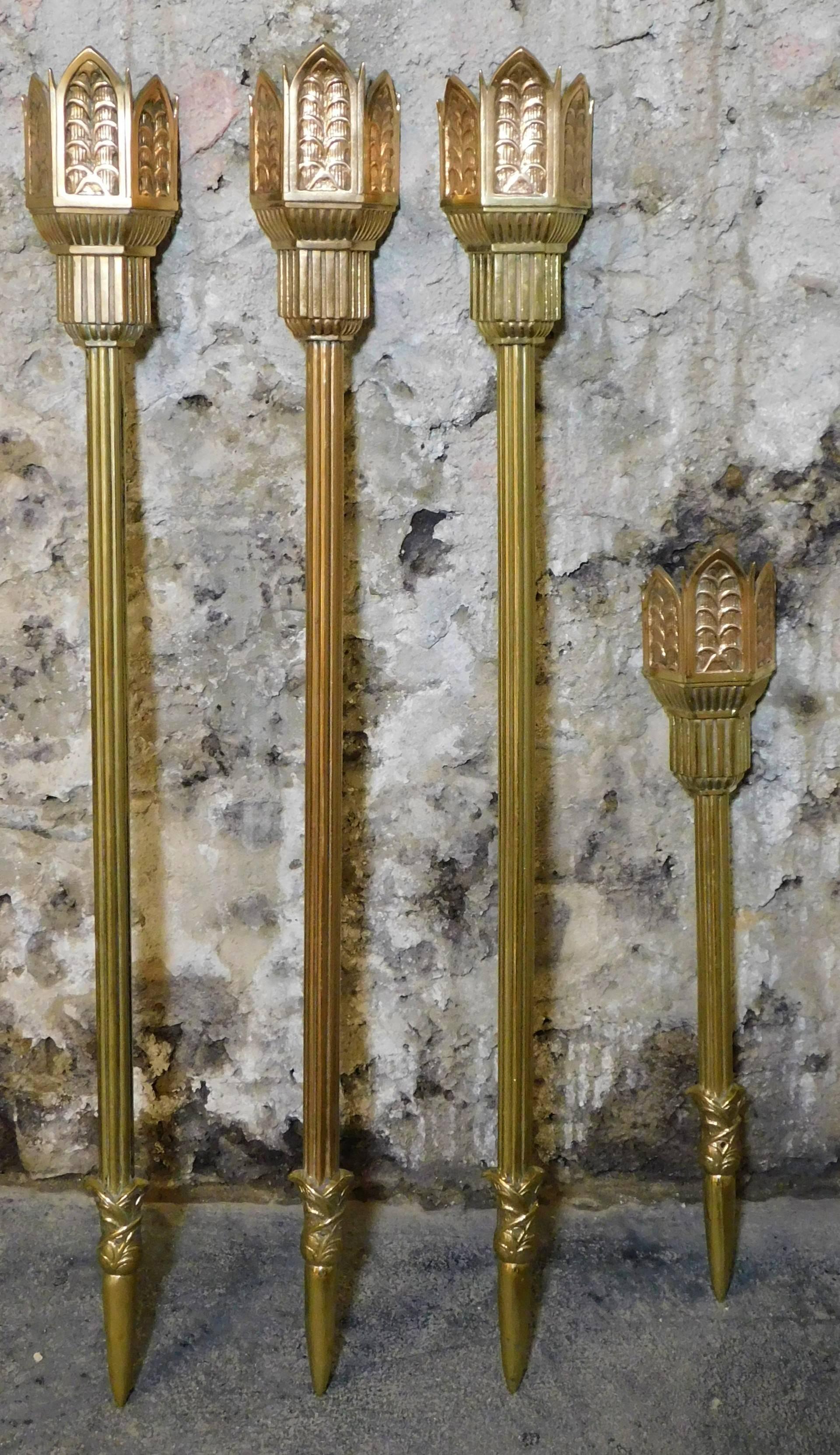 These are six tall sconces measuring 41.5 inches tall and two shorter sconces measuring 26 inches tall.  They all have wired light sockets in them and are American made of cast bronze.