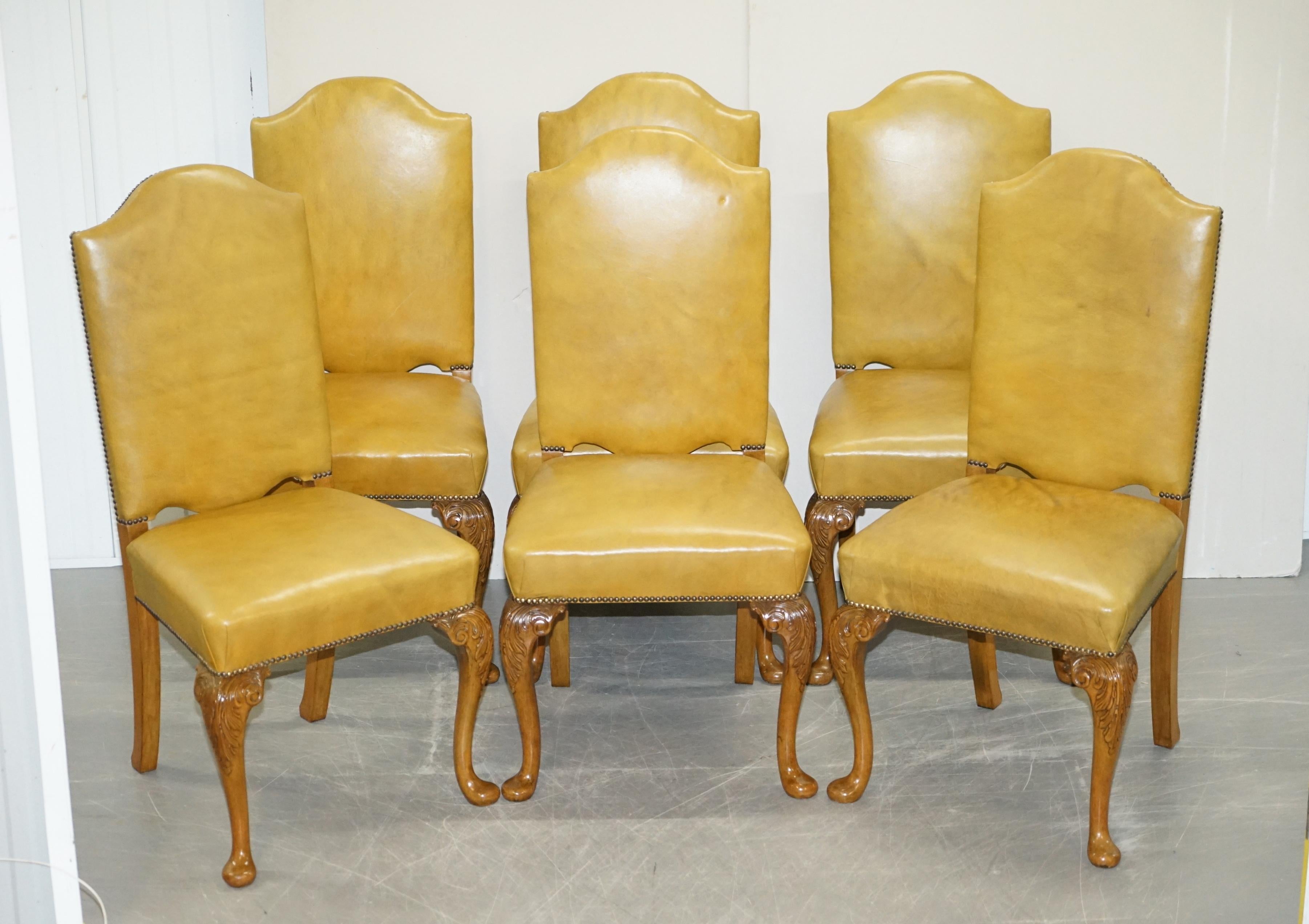 We are delighted to this stunning suite of eight Denby & Spinks Art Deco carved Walnut dining chairs with pale green leather upholstery

These are part of a suite, in total I have 8 dining chairs, an extending dining table, large inverted