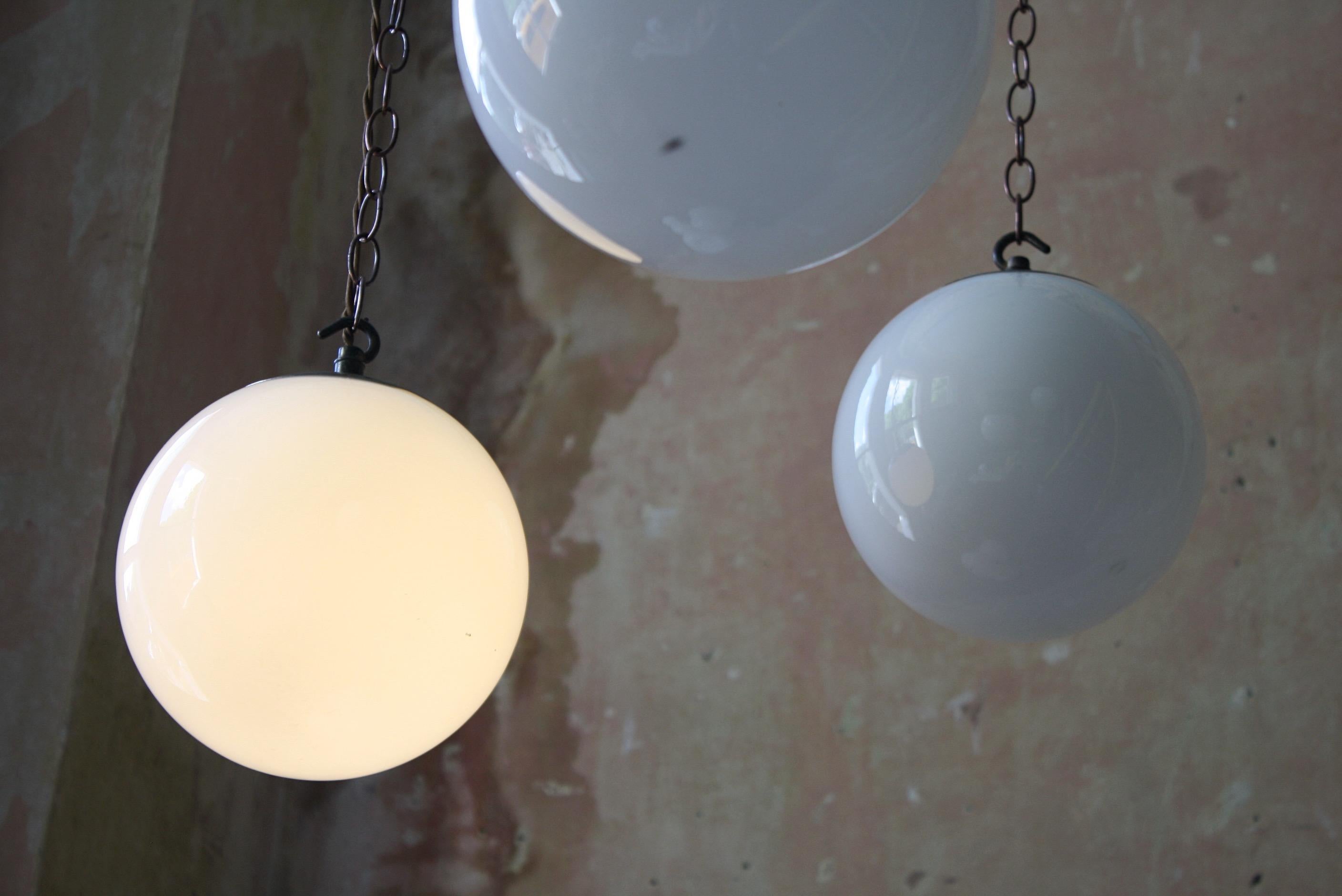 8 Available Mid-20th Century Small Glass Opaline and Brass Globe Pendants Lights 1