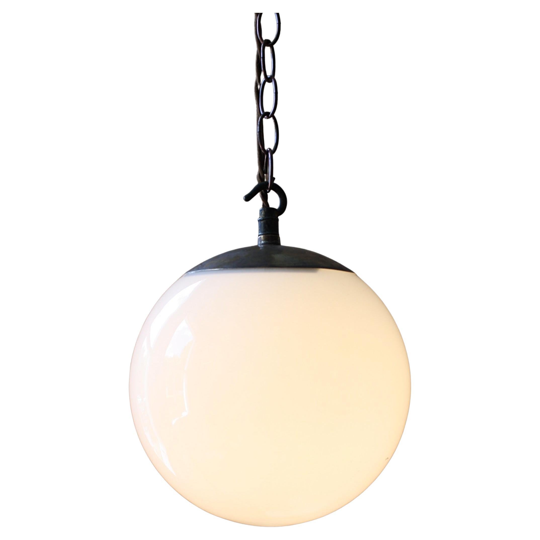 8 Available Mid-20th Century Small Glass Opaline and Brass Globe Pendants Lights