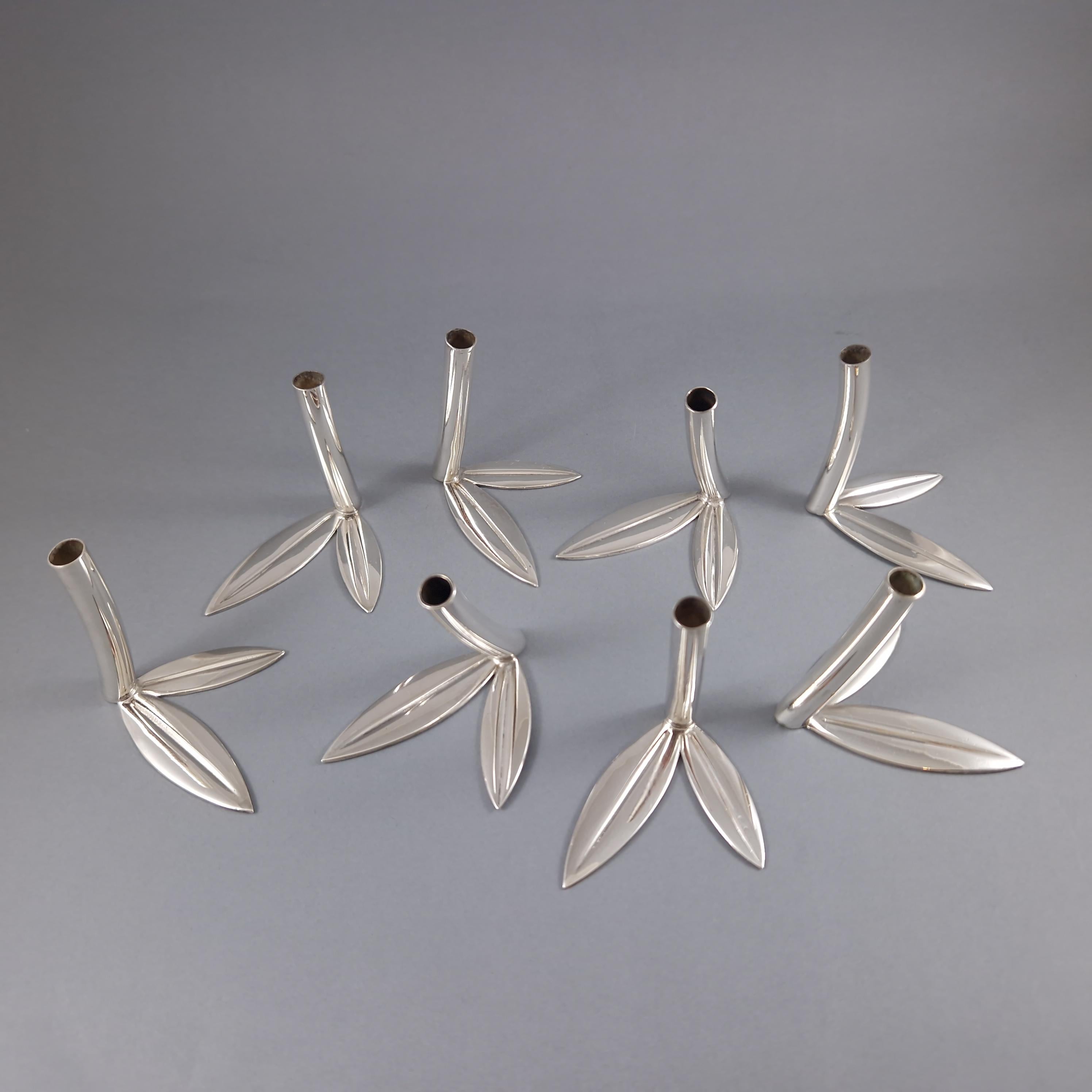 Set of eight bouquet flowers holders in Sterling Silver in the shape of a branch and leaves 
925 Silver hallmark
Length: 7.2 cm 
Height: 6.4 cm 
Weight: 269 grams
