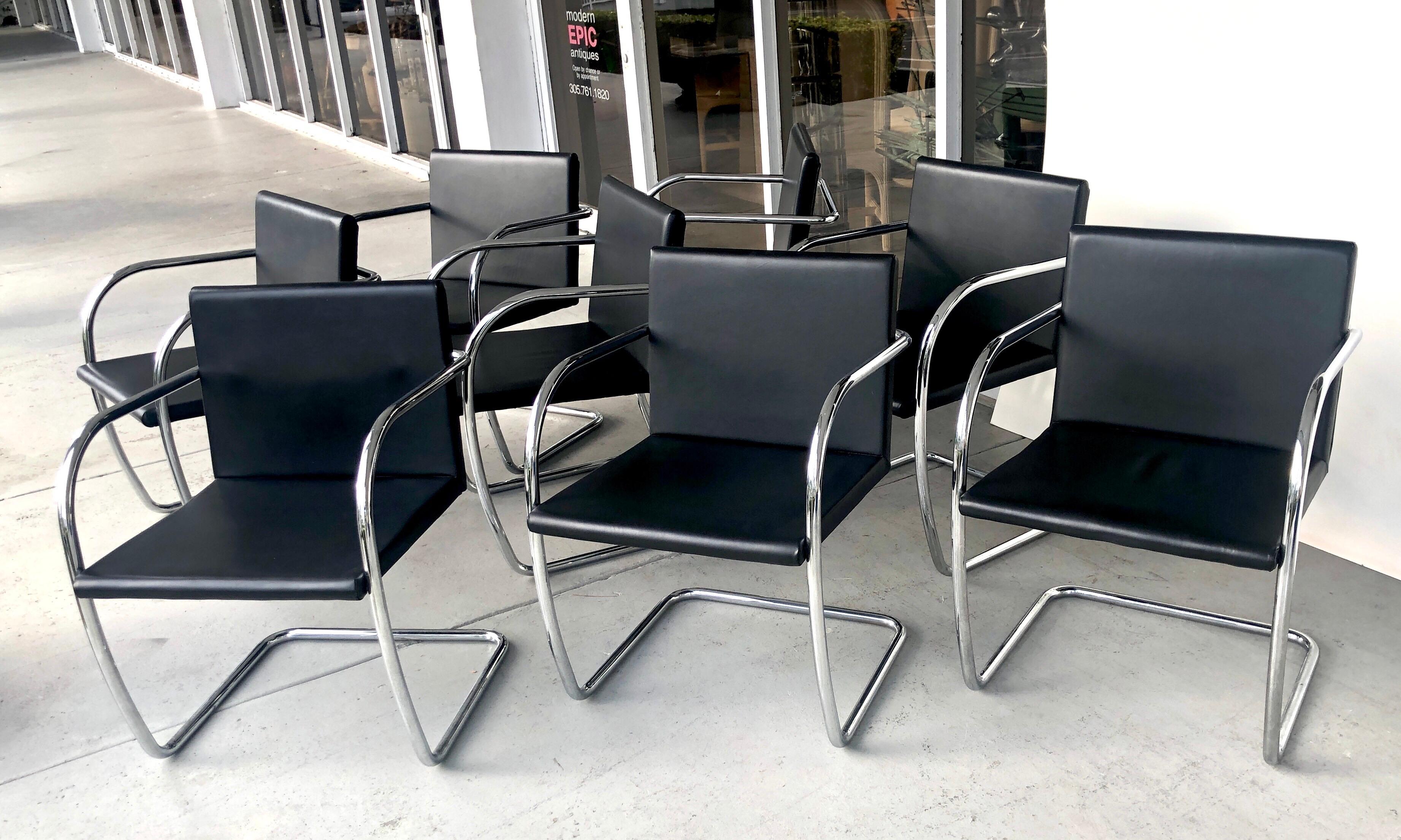 A set of 8 thin pad Brno chairs. Original black leather upholstery with chrome frames.