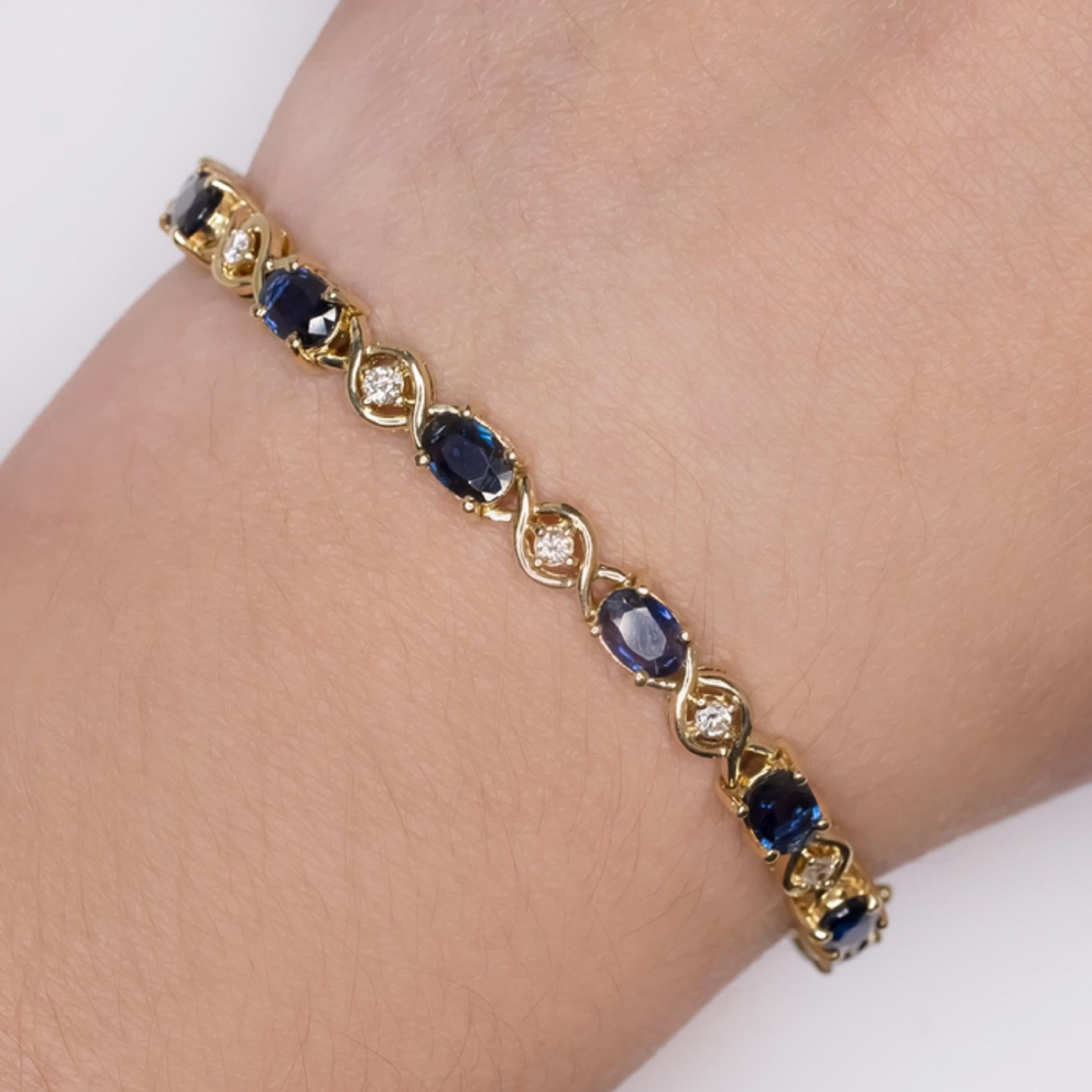 This sapphire and diamond bracelet offers a rich pop of color and a classic, refined look! Vibrant natural diamonds are interspersed with 7.8 carats of rich blue natural sapphires for eye catching contrast and sparkle! The sapphires are beautiful in