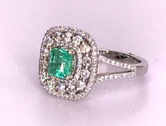 .8 Carat Colombian Emerald and Diamond Ring