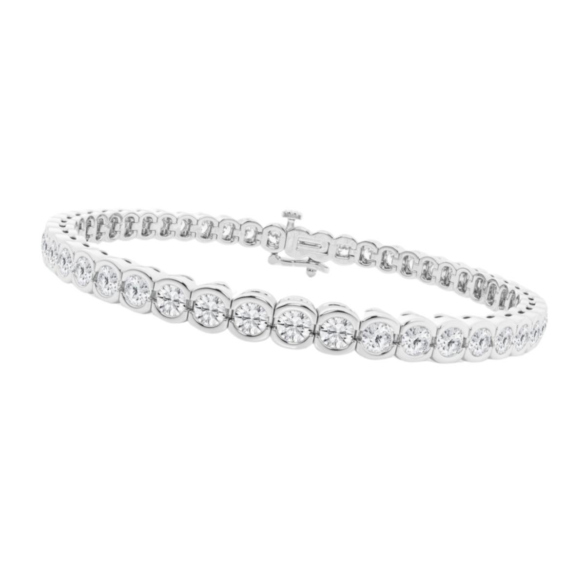 Introducing an exquisite 8 Carat Round Cut Diamond Platinum Tennis Bracelet, a dazzling testament to luxury and sophistication. This opulent bracelet features a stunning array of round-cut diamonds, totaling an impressive 8 carats in weight.
Each