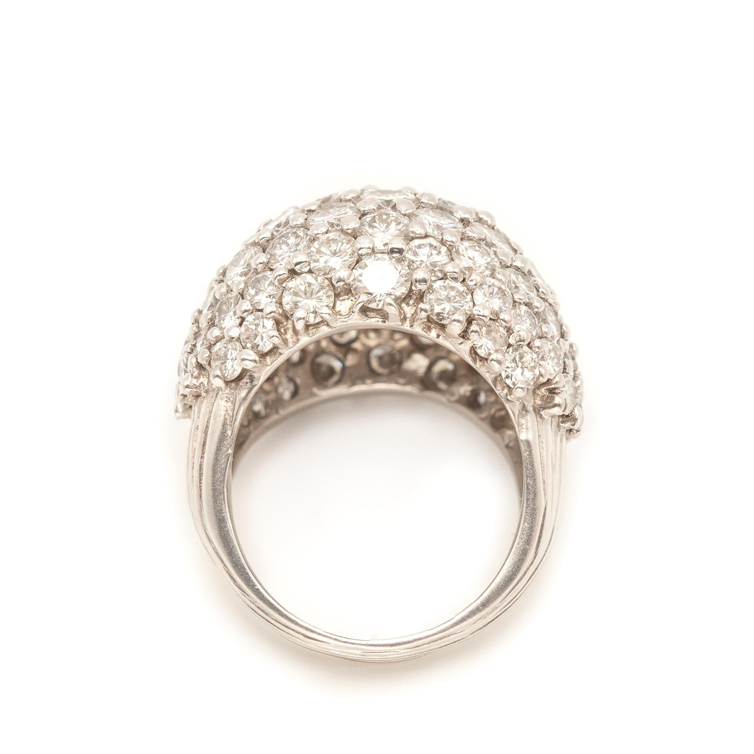 Platinum Diamond Dome Ring encrusted with approximate 8 carats of Diamonds in H color & SI clarity

Ring Size: 7 

Approximate Measurements: 18 mm wide at front

Total Approximate Weight: 23.0 grams

Hallmarks: PLAT

Appraised Value: $23500

AGI
