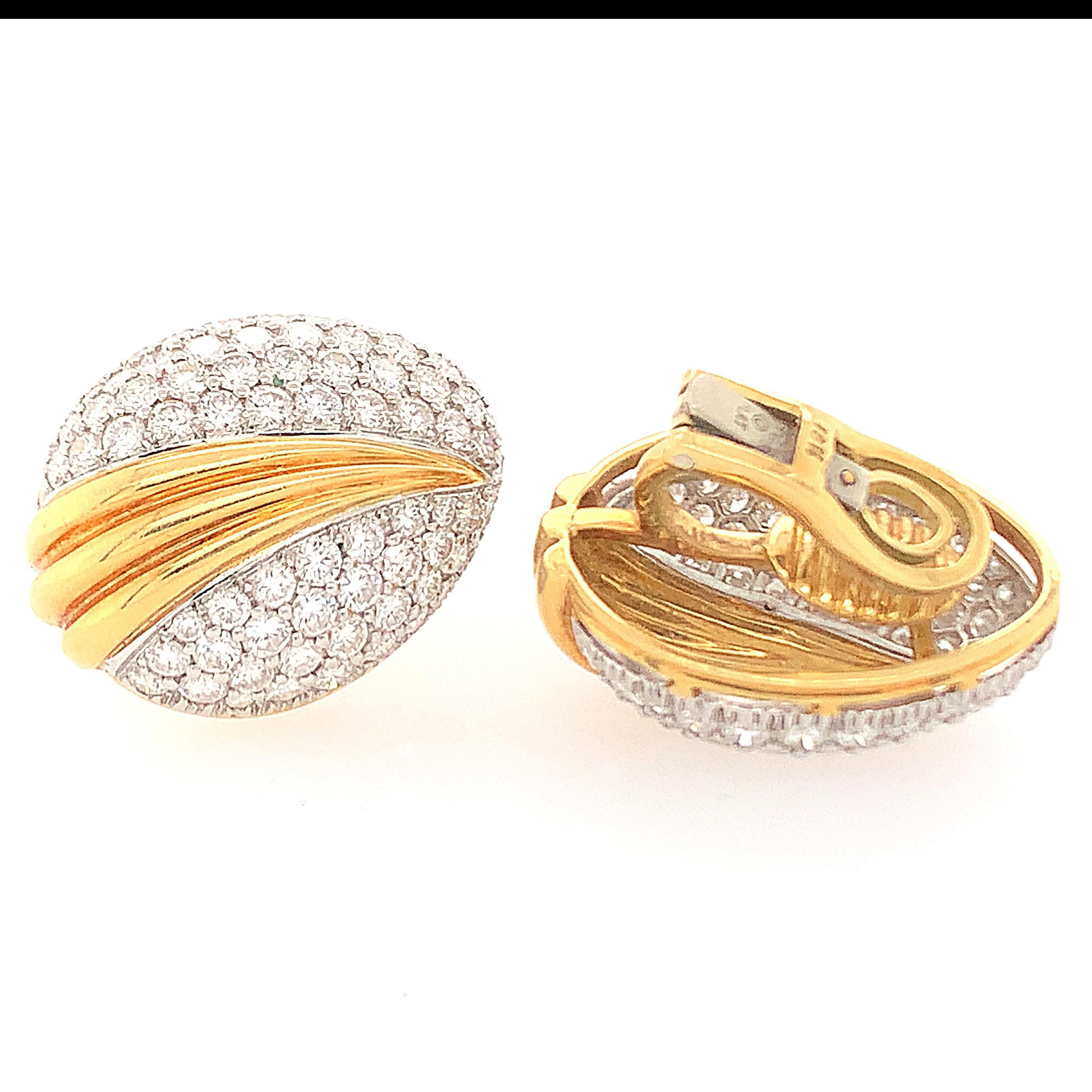 Platinum and 18K Y/gold diamond earclips, RBC diamonds weighing approx. 8.00 cts, GH VS, stamps PLAT 18K TGD measures 1 x 3/4 inch, weight 16.2 dwt.