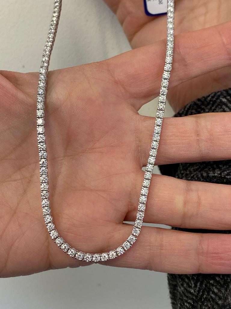 Diamond necklace set in 14K white gold. Each stone weighs 0.05 carats and the total diamond weight is 8.02 carats. The color of the stones are G-H, the clarity is SI2-SI3. The necklace is 17 inches and set in a 4 prong.