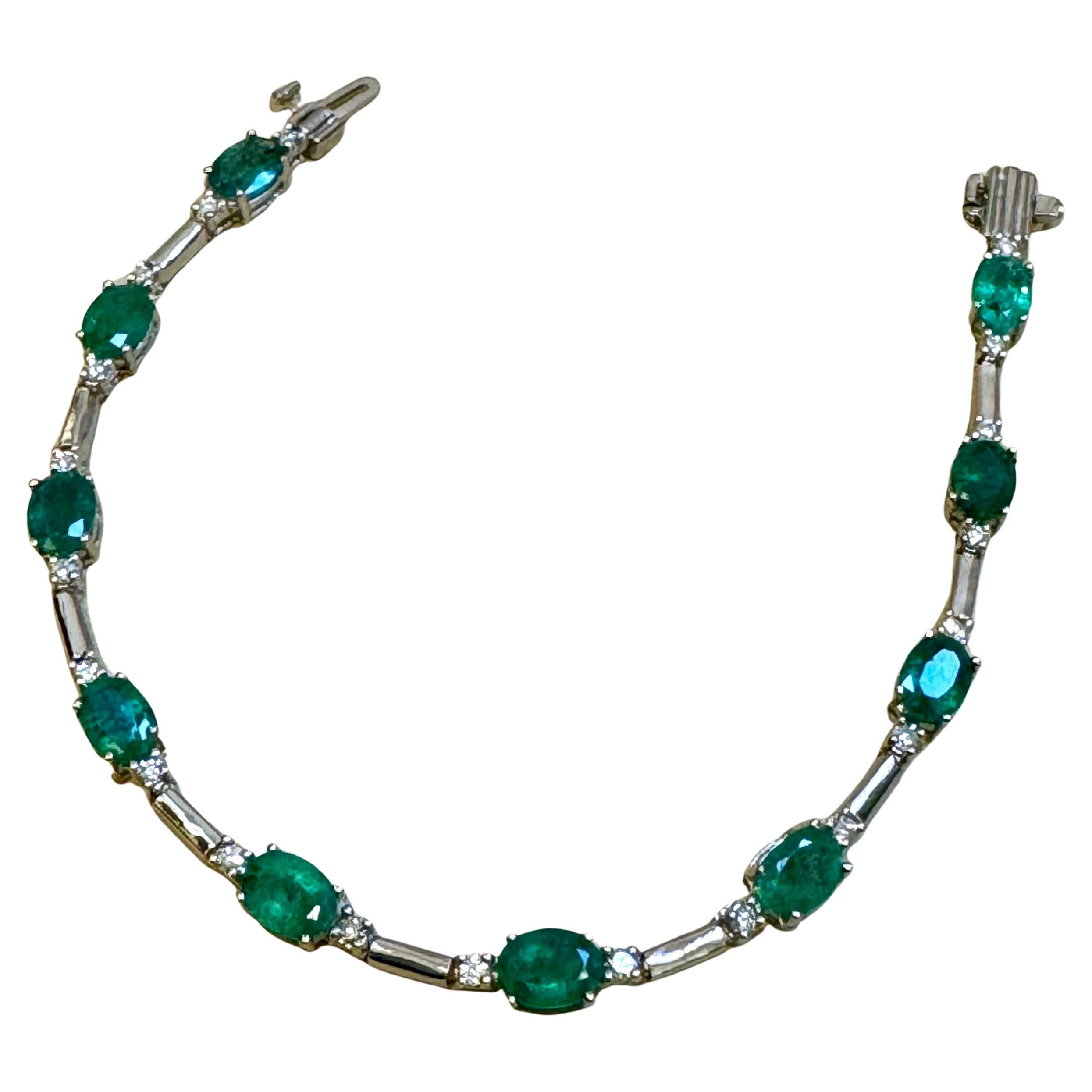 Bracelet de tennis en or blanc 14 carats, émeraude 8 carats et diamant 1 carat, 7.25".