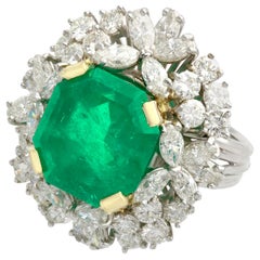 Antique 8 Carat Emerald and 3.25 Carat Diamond Platinum Cluster Ring