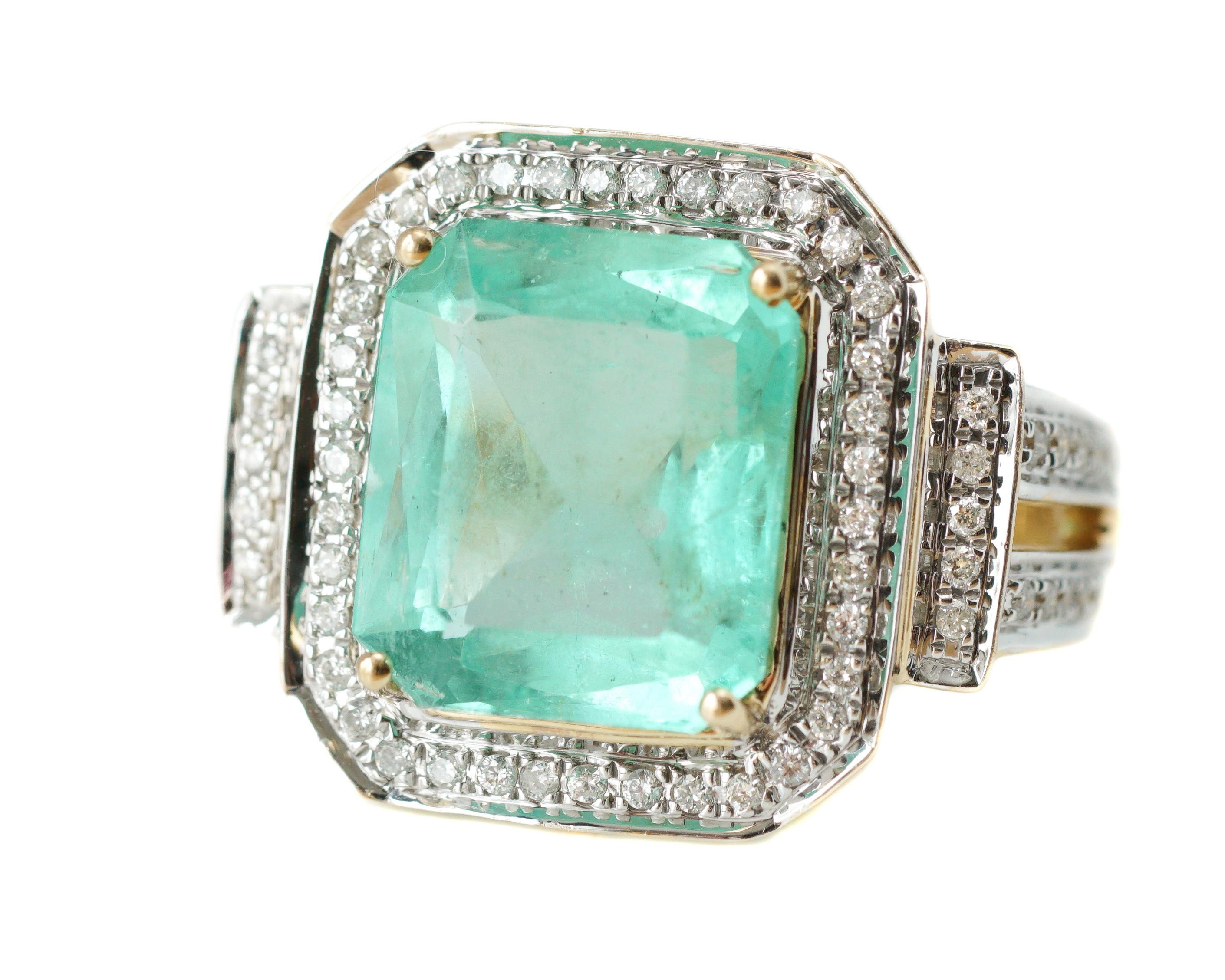Contemporary 8 Carat Emerald and .50 Carat Diamond 18 Karat Two-Tone Gold Ring
