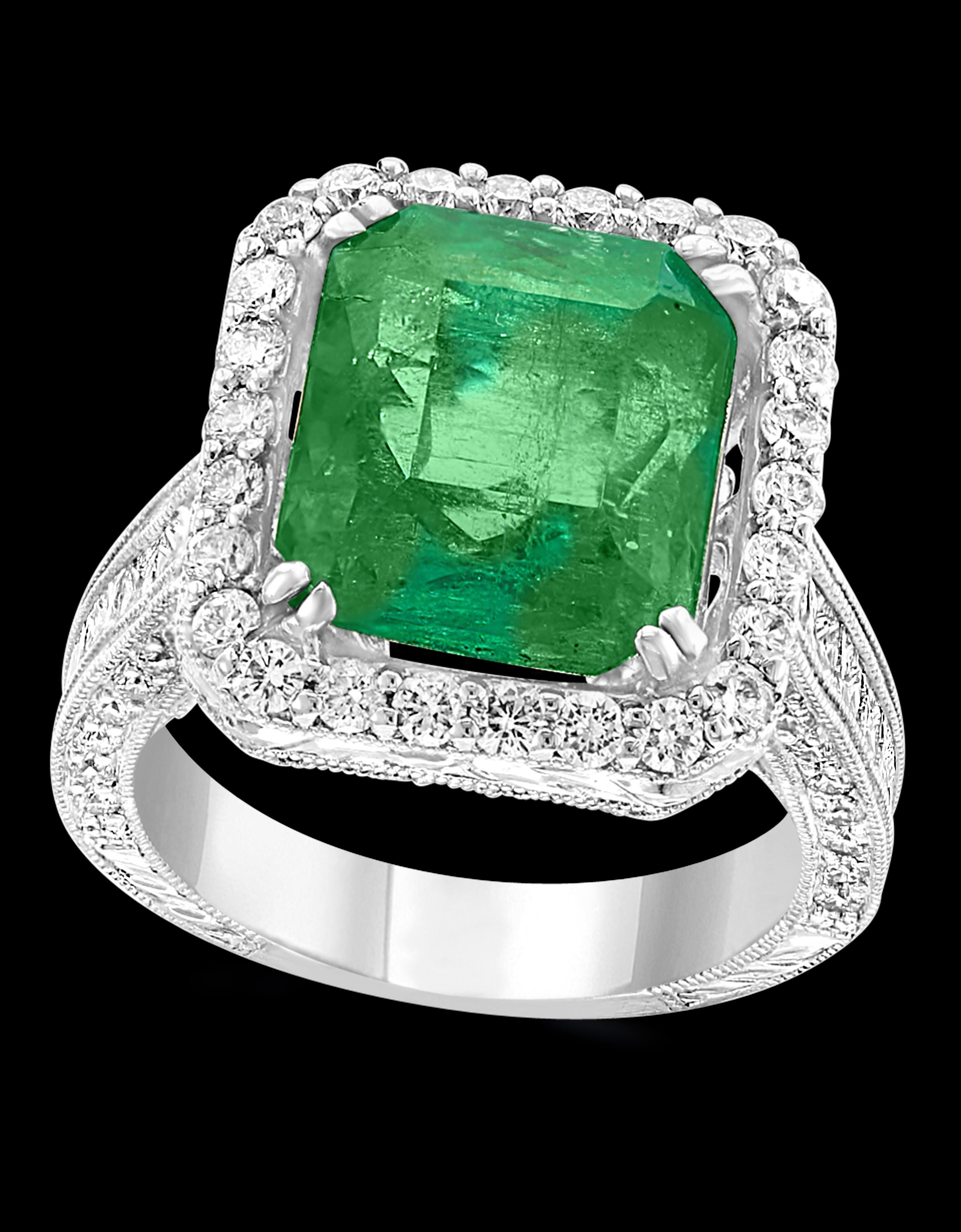 A classic, Cocktail ring 
8.0 Carat  Colombian Emerald and Diamond Ring, Estate with a color and clarity of F/G and VS1/VS2, respectively with no color enhancement.
 ( Natural emeralds are commonly enhanced: but this one is only Minor clarity