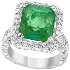 Antique 8 Carat Emerald Cut Colombian Emerald and Diamond 18 Karat Gold Ring Estate