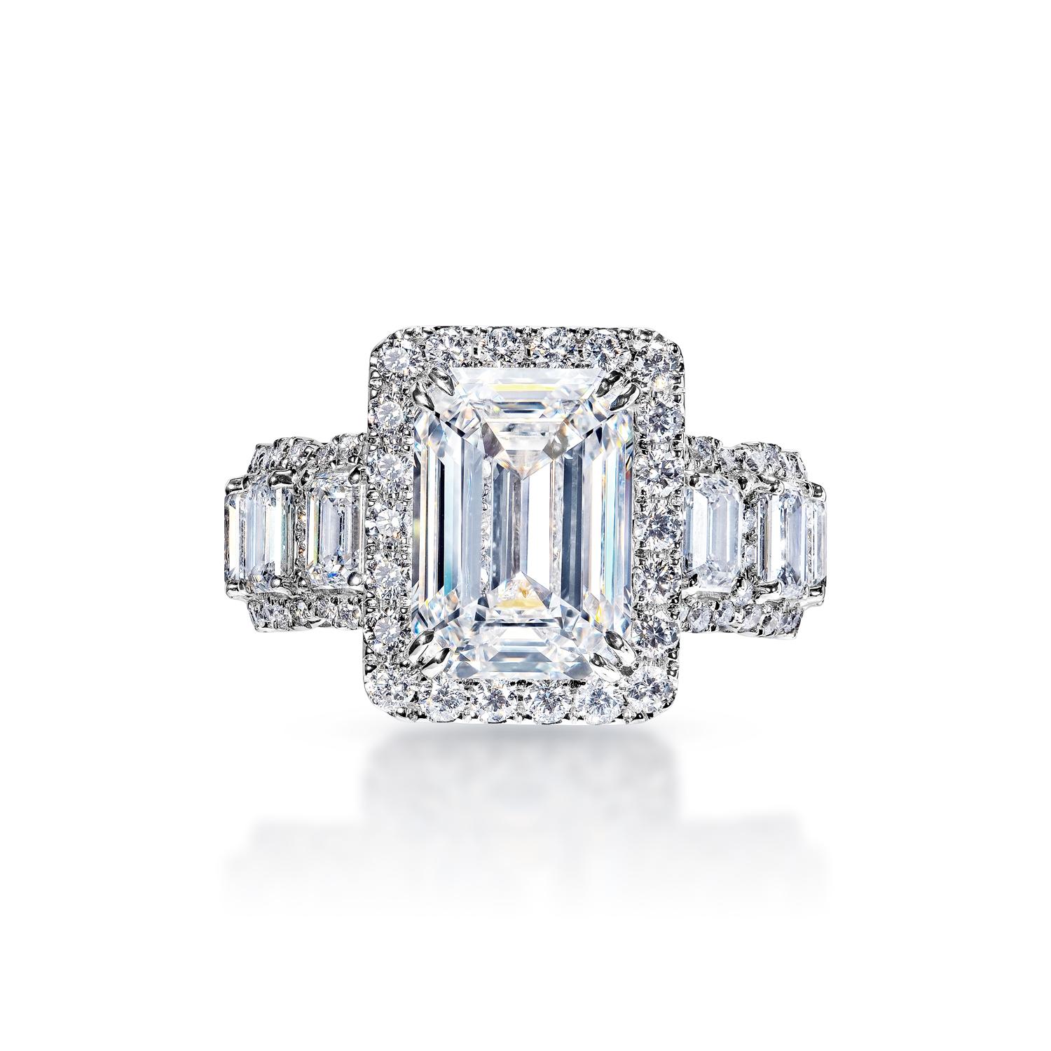 GIA Certified


Center Earth Mined Diamond:
Carat Weight: 5.03 Carats
Color: G*
Clarity: VVS1
Style: Emerald Cut
*This Diamond has been treated by one or more processes to change its color

Ring:
Metal: 18 Karat White Gold
Carat Weight: 3.00