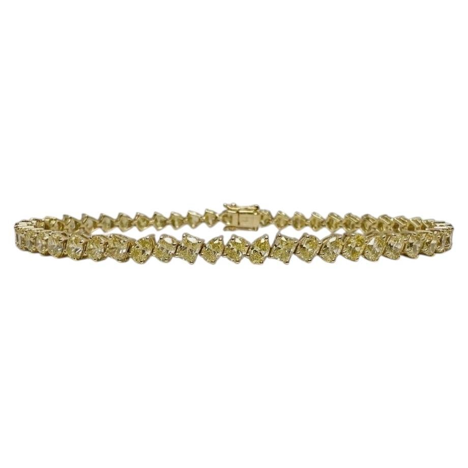 Bracciale tennis con diamanti gialli fancy da 8 carati di forme miste, in oro giallo 18k