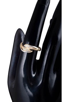 8-carat gold ring set with four white stones. 1980s