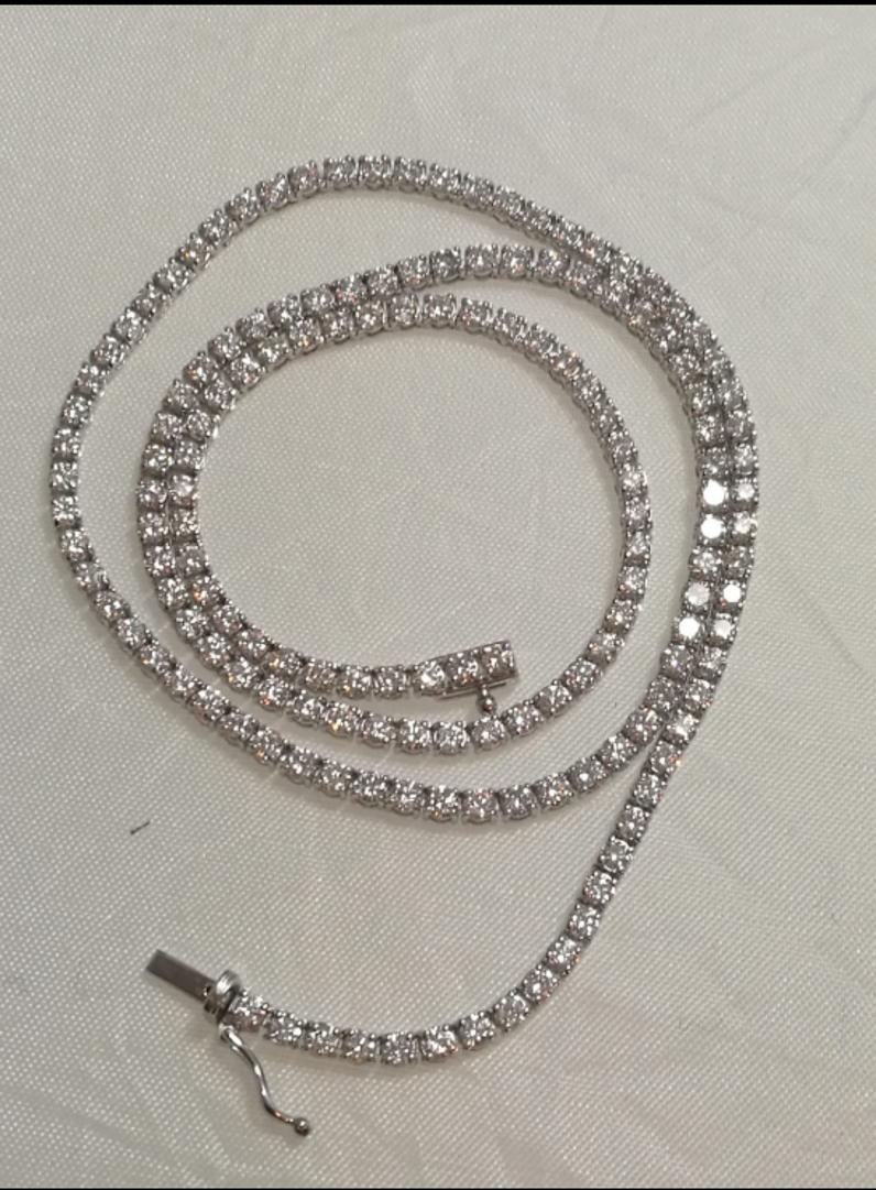 Amazing 8 carats natural earth mined diamond tennis necklace set in 14 Kt white gold.
All the diamonds are white and eye clean.

