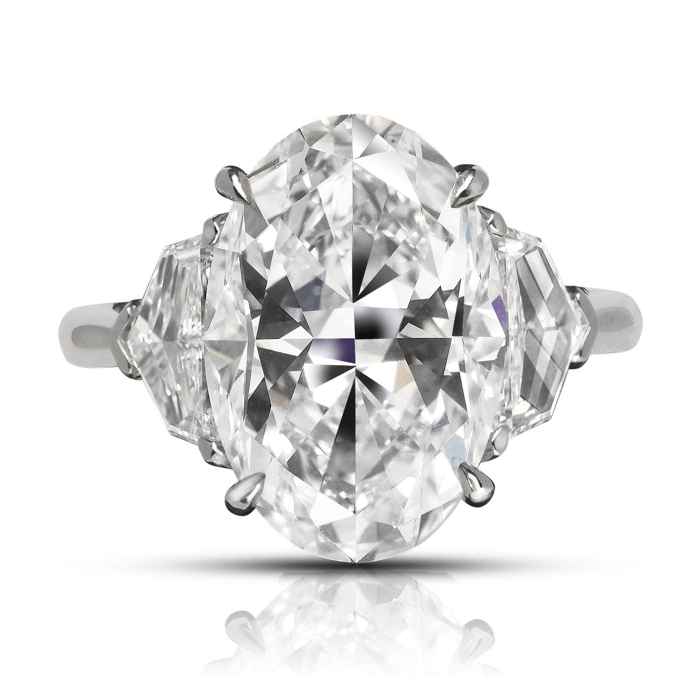 BAGUE DE FIANÇAILLES EN PLATINE AVEC DIAMANT JASMINE DE MIKE NEKTA
CERTIFIÉ GIA

Diamant central :
Poids en carats : 6,5 carats
Couleur : D*
Clarté : VVS1
Style : OVAL
Mesure :  14.8 x 10,0 x 6,6 mm

* Ce diamant a été traité par un ou plusieurs