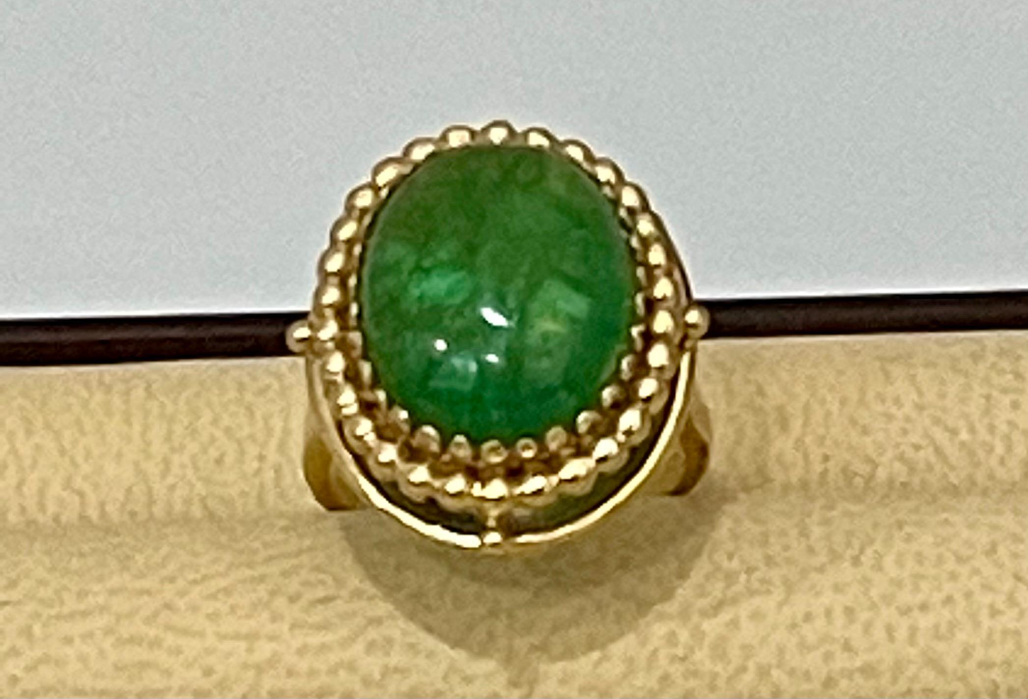 Women's or Men's 8 Carat Oval Emerald Cabochon 14 Karat Yellow Gold Cocktail Ring Vintage