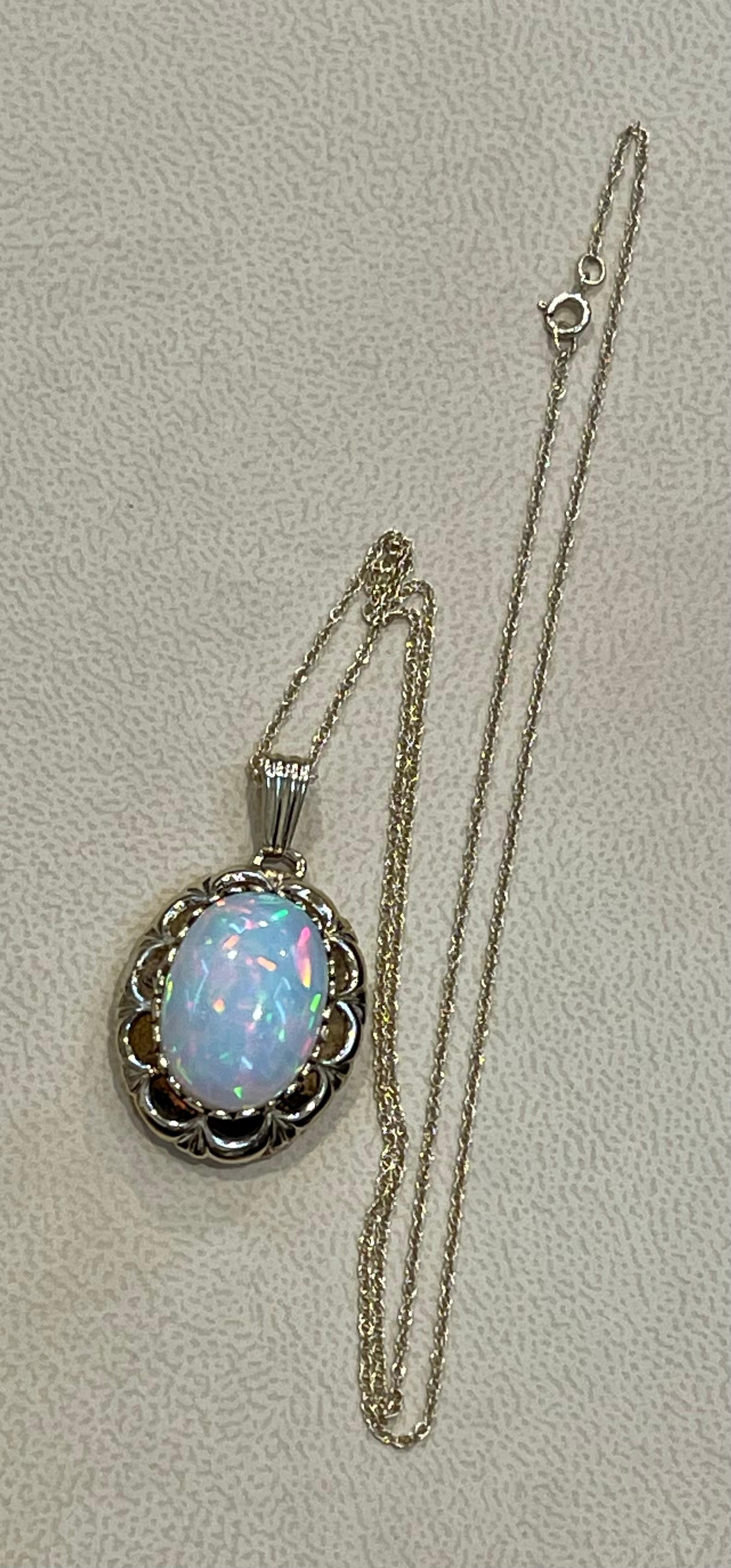 8 Carat Oval Ethiopian Opal Pendant / Necklace 14 Karat Yellow Gold Necklace 2