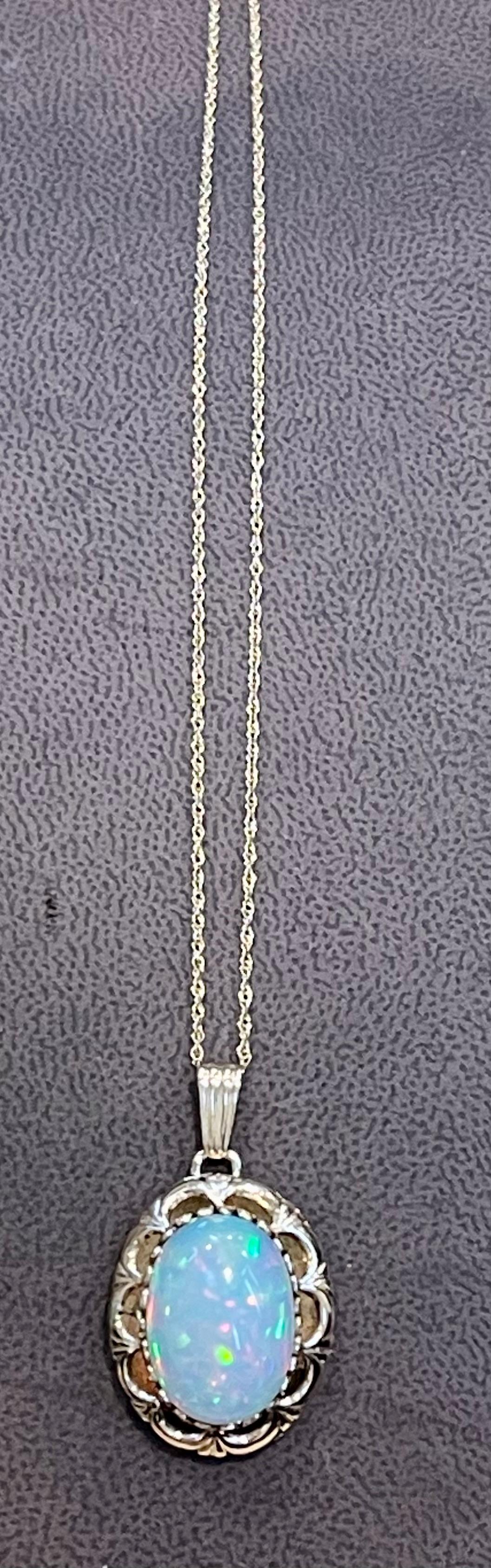 8 Carat Oval Ethiopian Opal Pendant / Necklace 14 Karat Yellow Gold Necklace 5