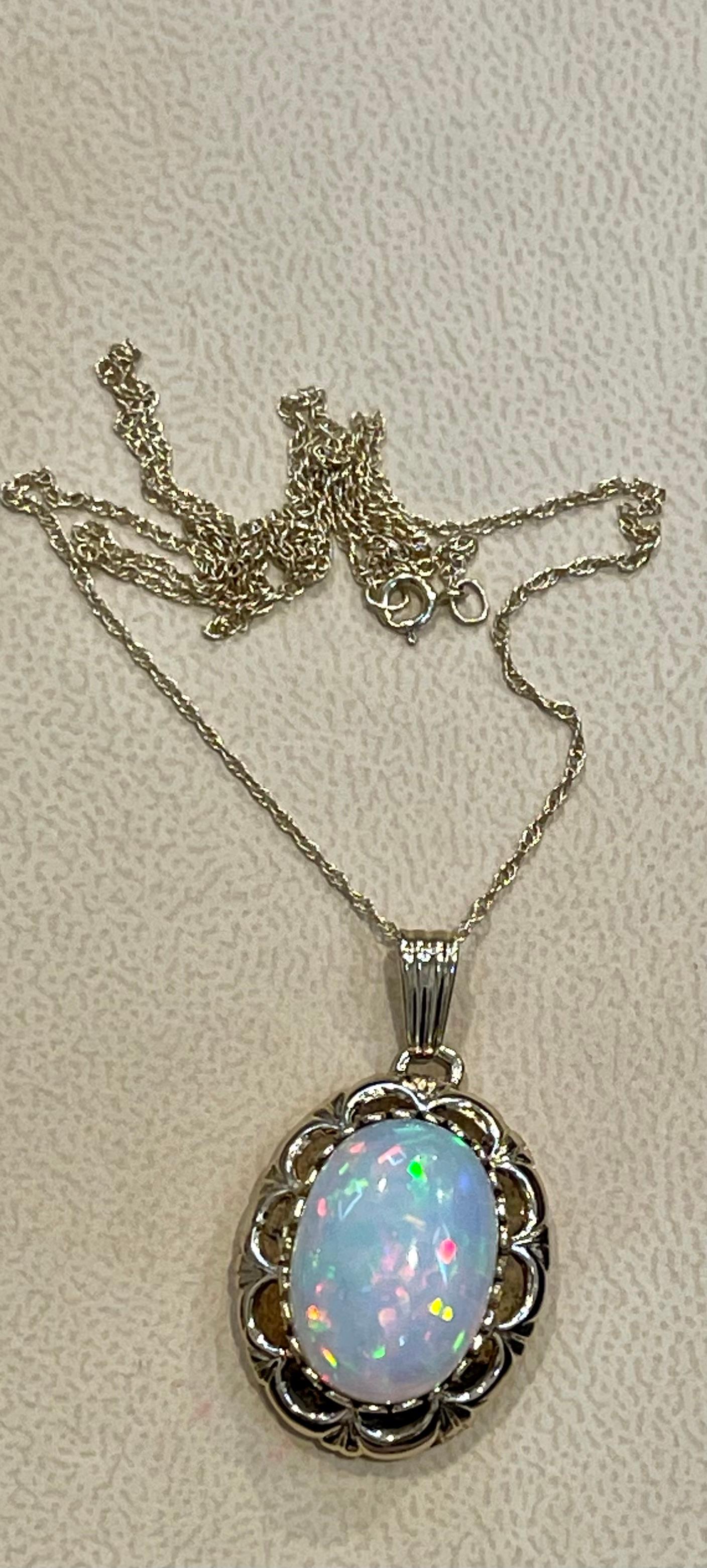 8 Carat Oval Ethiopian Opal Pendant / Necklace 14 Karat Yellow Gold Necklace 6