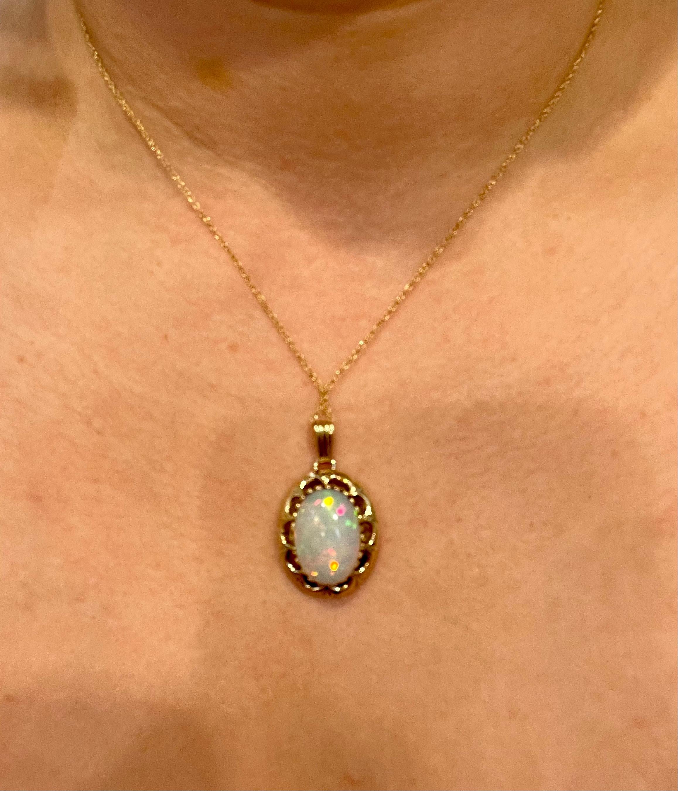 8 Carat Oval Ethiopian Opal Pendant / Necklace 14 Karat Yellow Gold Necklace 7