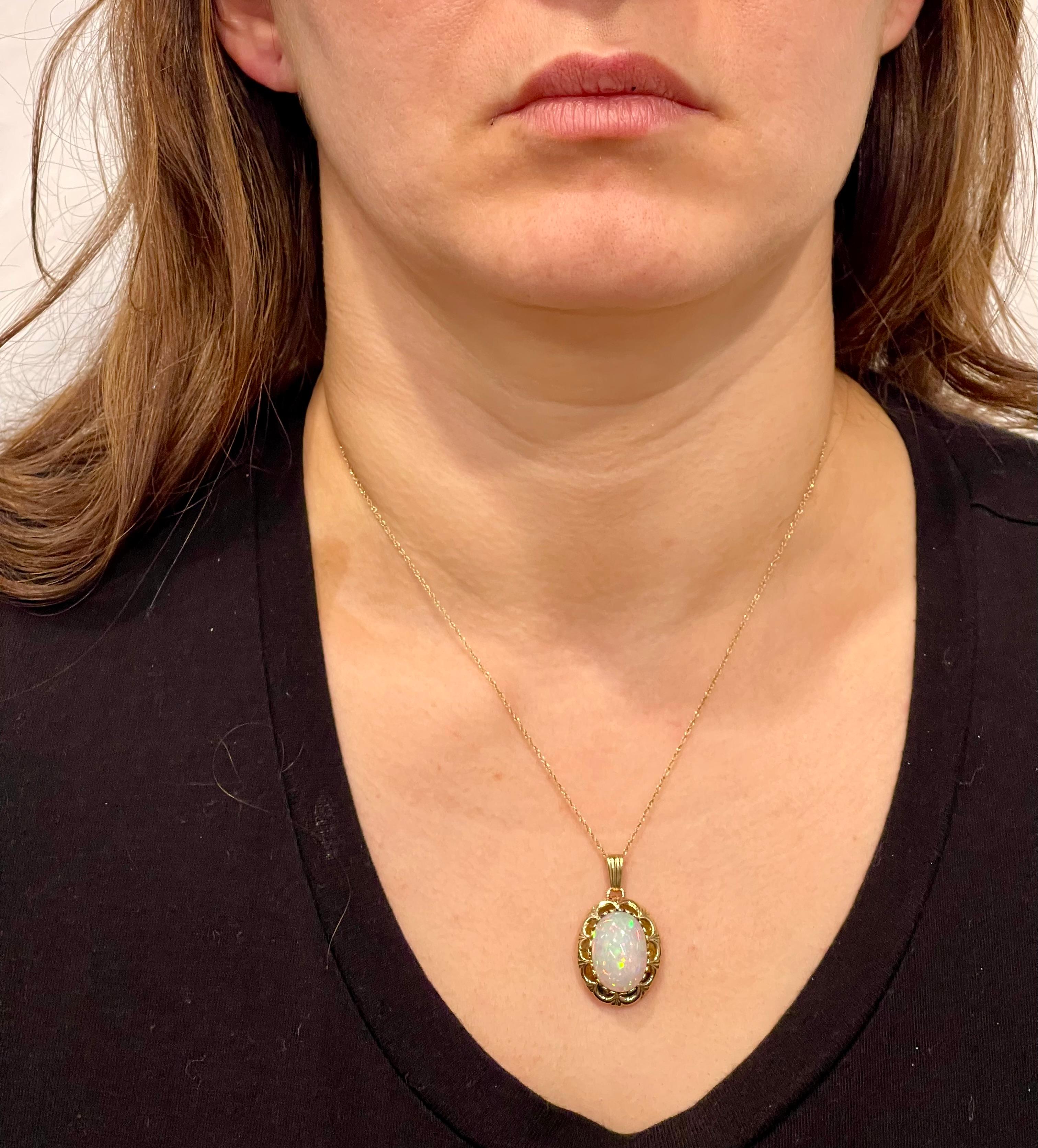 Women's 8 Carat Oval Ethiopian Opal Pendant / Necklace 14 Karat Yellow Gold Necklace