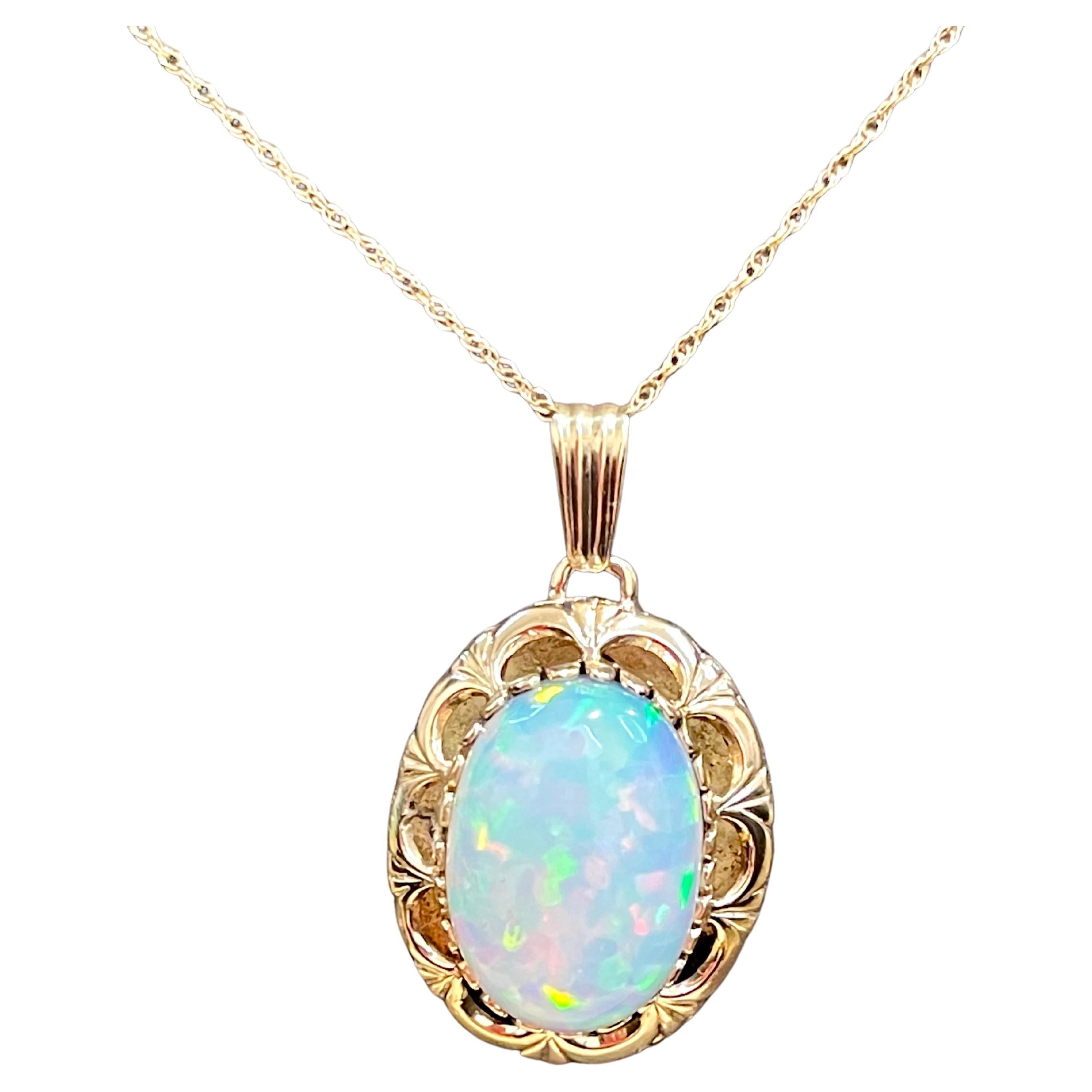 8 Carat Oval Ethiopian Opal Pendant / Necklace 14 Karat Yellow Gold Necklace