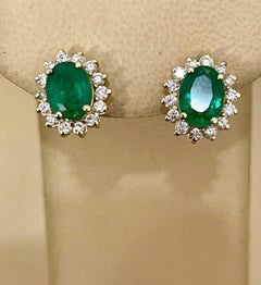 8 Carat Oval Shape Emerald and Diamond Post Back Earrings 14 Karat White Gold