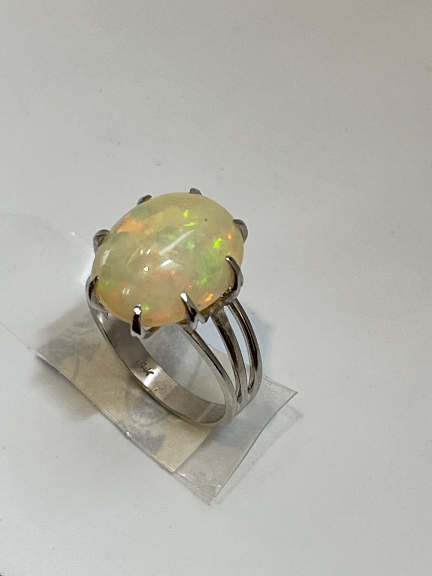 8 Carat Oval Shape Opal Cocktail Ring 14 Karat White Gold, Estate In Excellent Condition For Sale In New York, NY