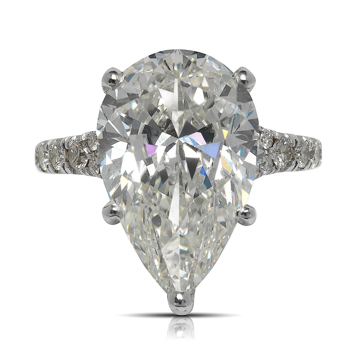 PLAMA  PEAR SHAPE 5 PRONG  DIAMOND ENGAGEMENT RING 18K WHITE GOLD  BY MIKE NEKTA

GIA CERTIFIED 
Center Diamond
Carat Weight: 7 Carats
Color :  J*
Clarity: VVS2
Style: PEAR BRILLIANT
Approximate Measurements: 16.6 x 10.7 x 6.5 mm
* This diamond has