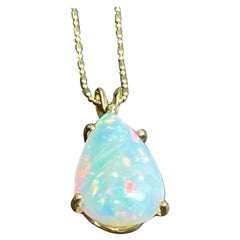 8 Carat Pear Shape Ethiopian Opal Pendant / Necklace 14 Karat Gold Estate