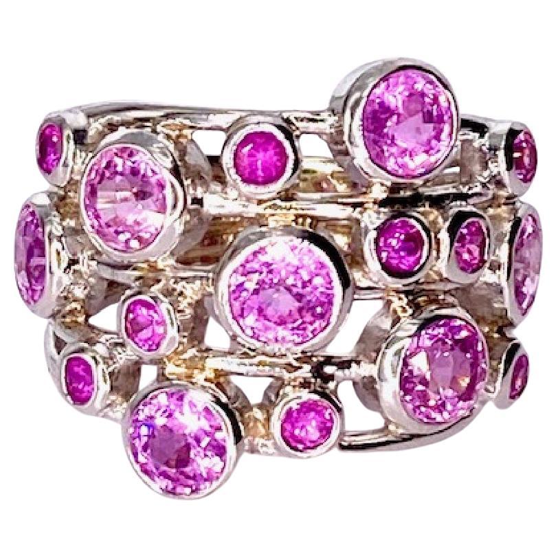 8 Carat Pink Sapphire Melody Ring For Sale